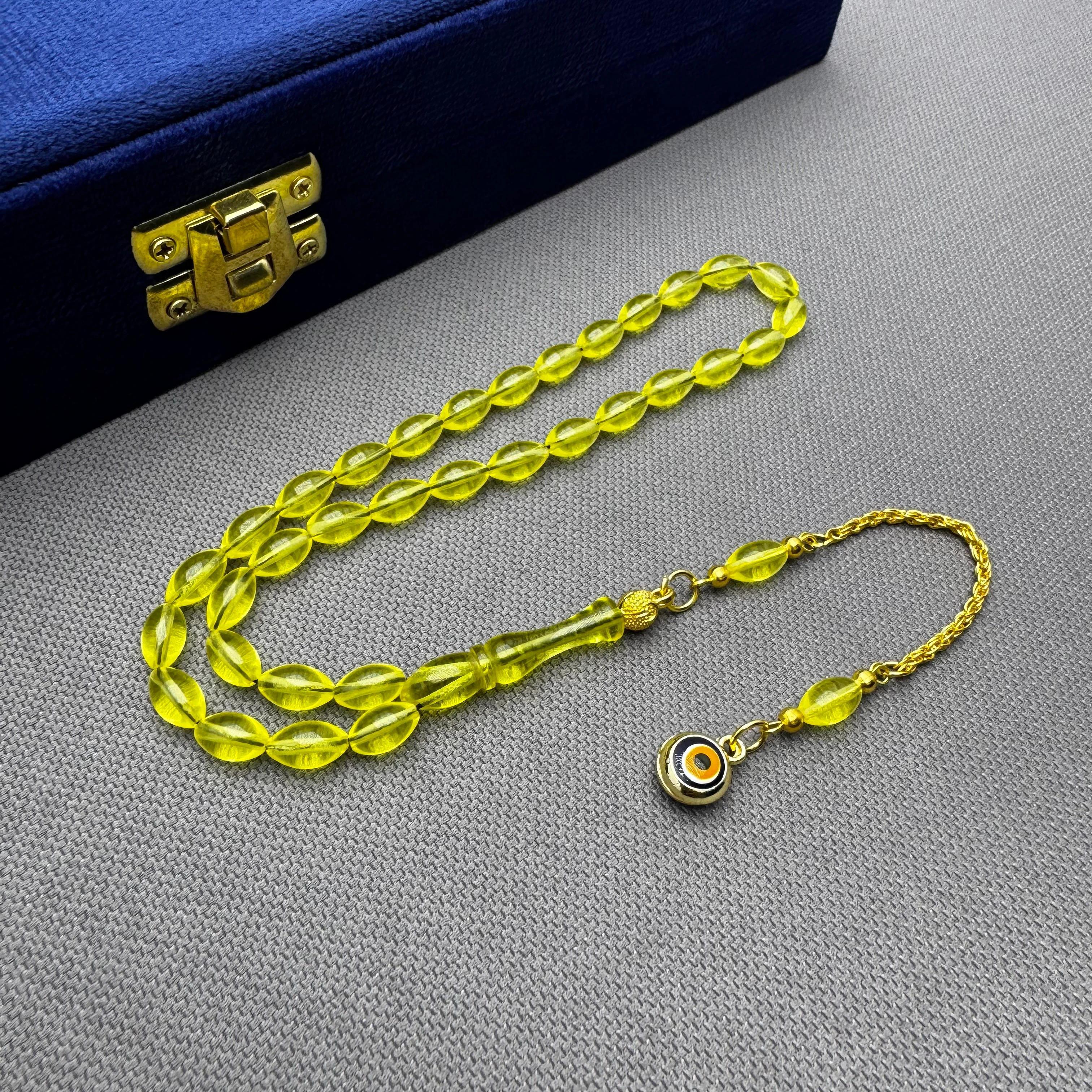 Nazar Boncuğu Detaylı Pirinç Püsküllü Bilek Boy Sarı Uçak Camı Tespih