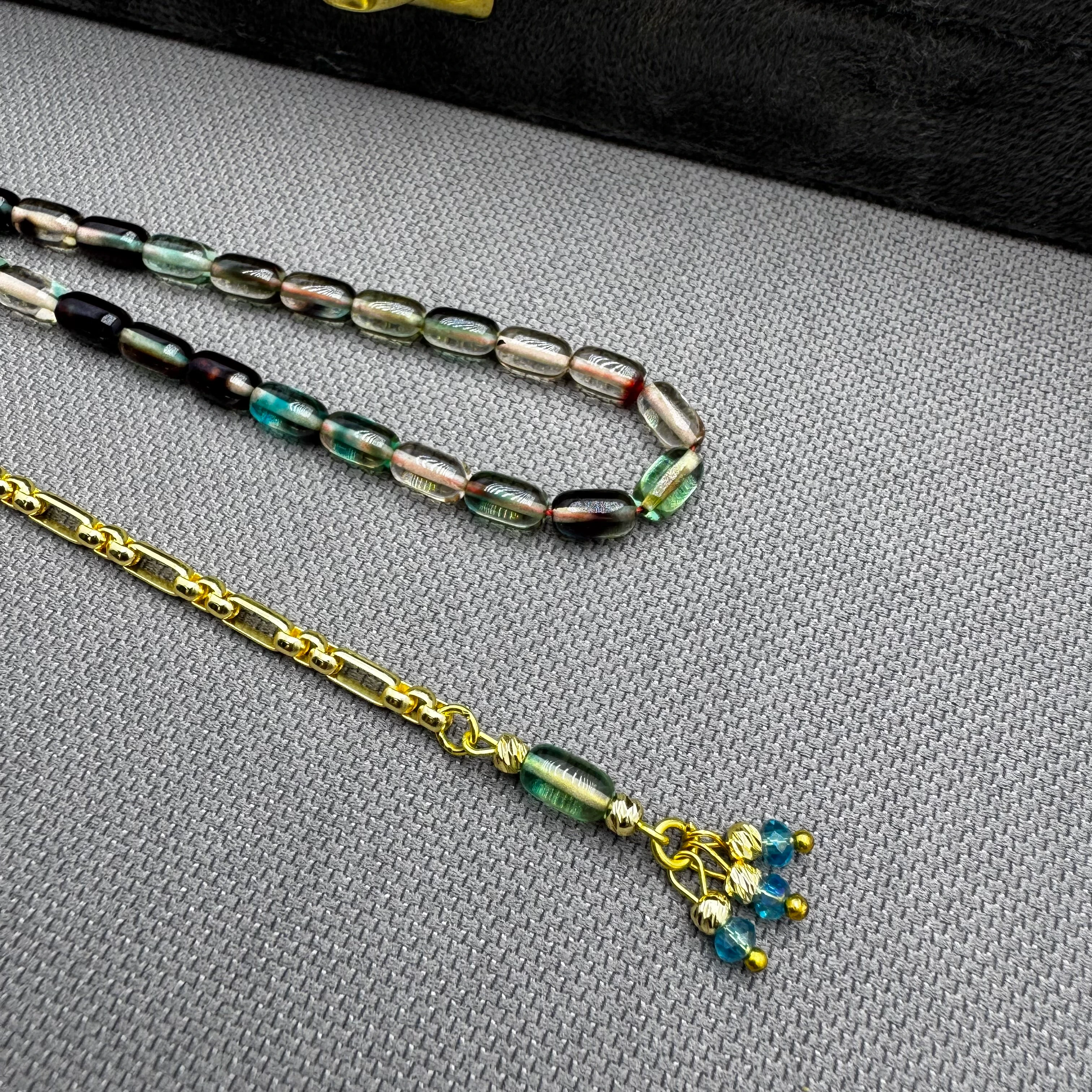 Özel Dizayn Pirinç Püsküllü Renk Süzmesi Hareli Bilek Boy Kehribar Tespih