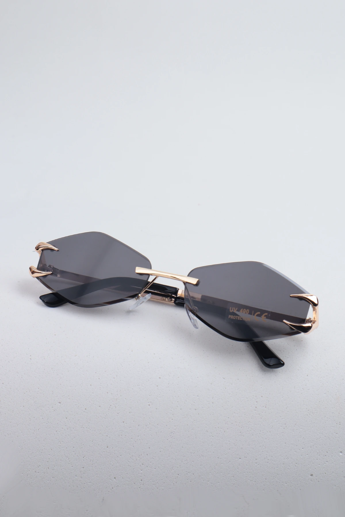 Auroven Çerçevesiz Pençe Detaylı Metal Tasarım Kadın Güneş Gözlüğü - siyah