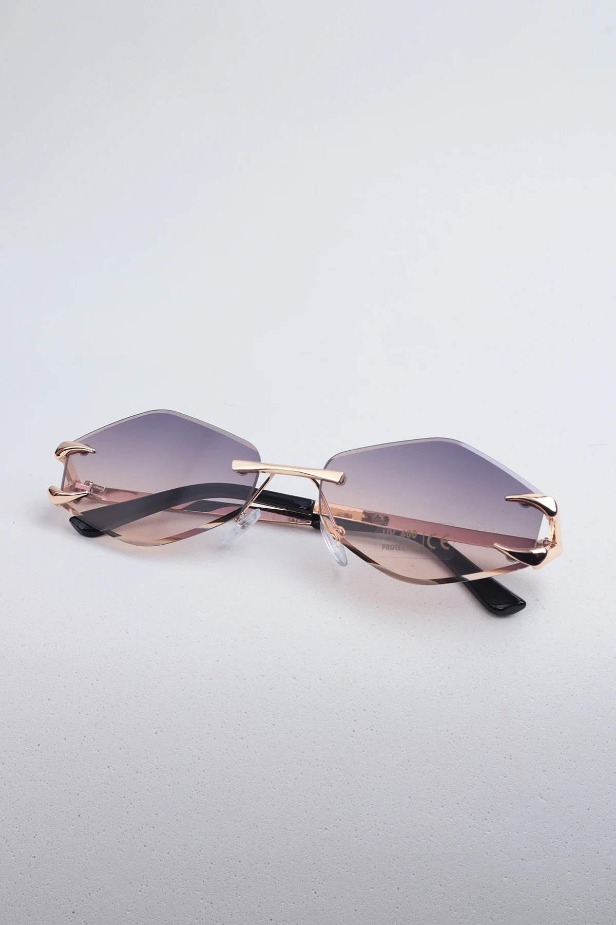 Auroven Çerçevesiz Pençe Detaylı Metal Tasarım Kadın Güneş Gözlüğü - Somon