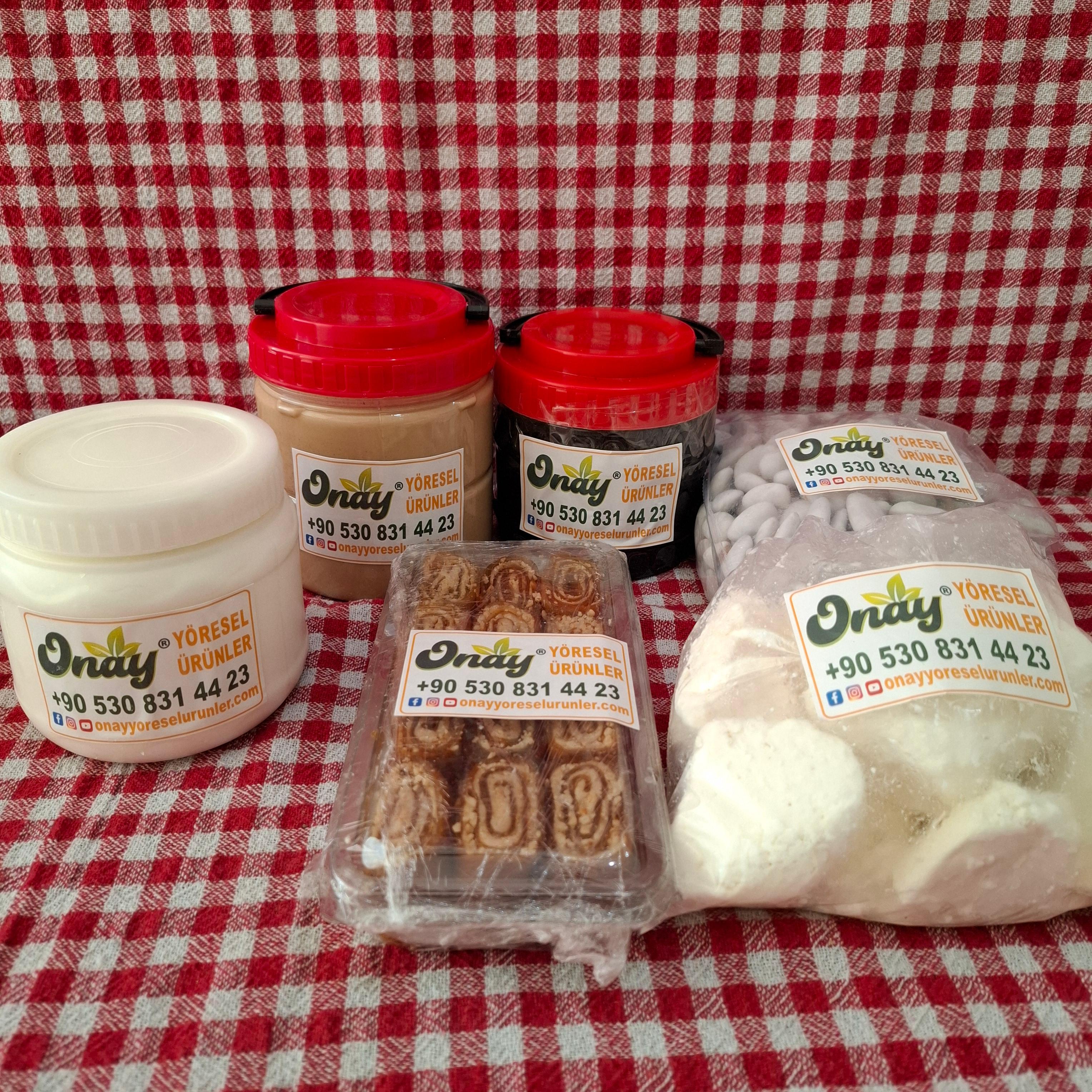 6 Çeşit ürün(1 kg Tahin,1 kg Pekmez,1 kg Köy Peyniri, 500 gr Badem Şekeri,500 gr ballı lokma ,1 kg Tulum Peyniri)