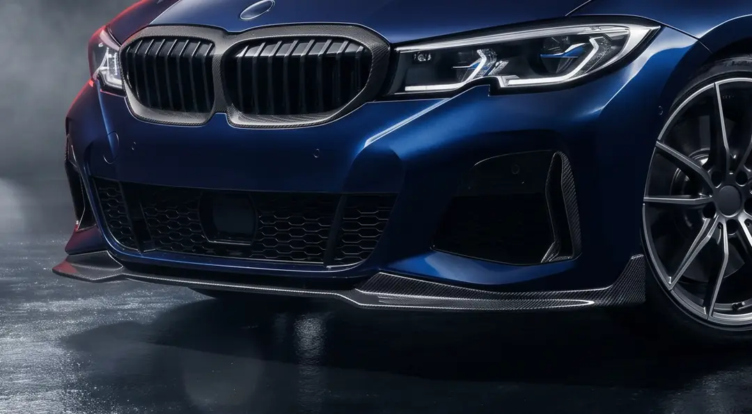 The carbon front splitter, corner canards and carbon kidney-grille surrounds — on the BMW 3 Series (G20) front end.