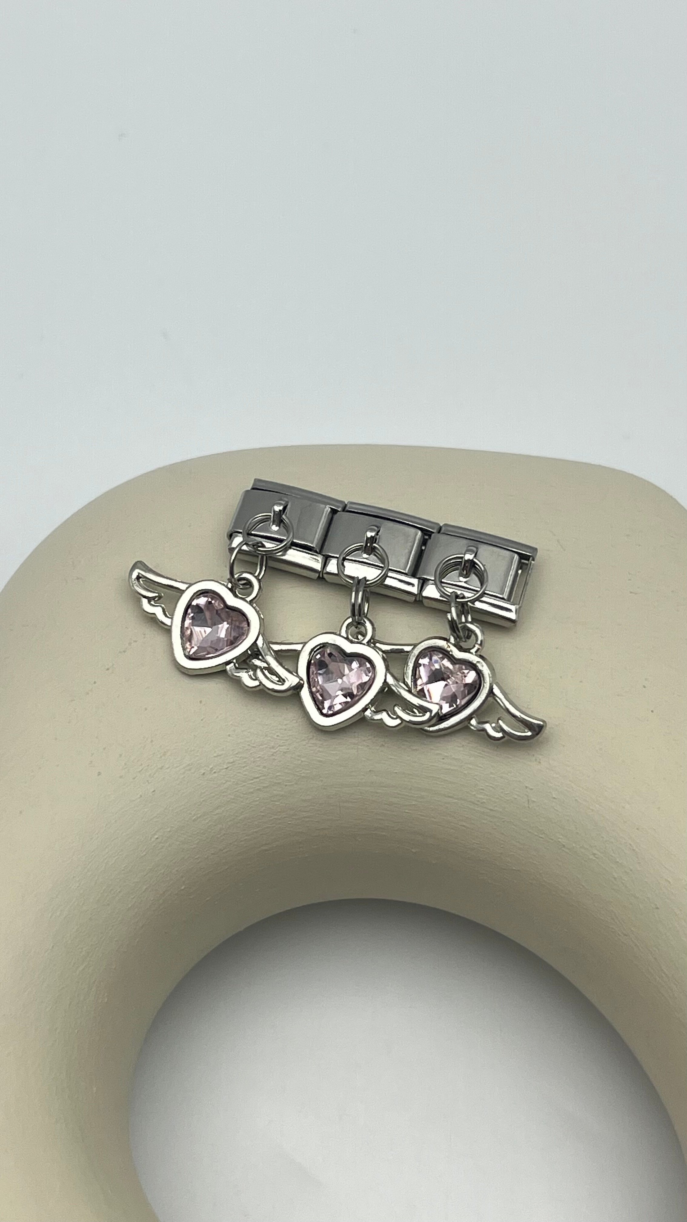 nomi charm