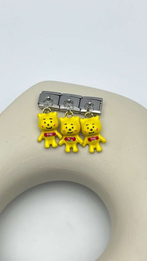 nomi charm