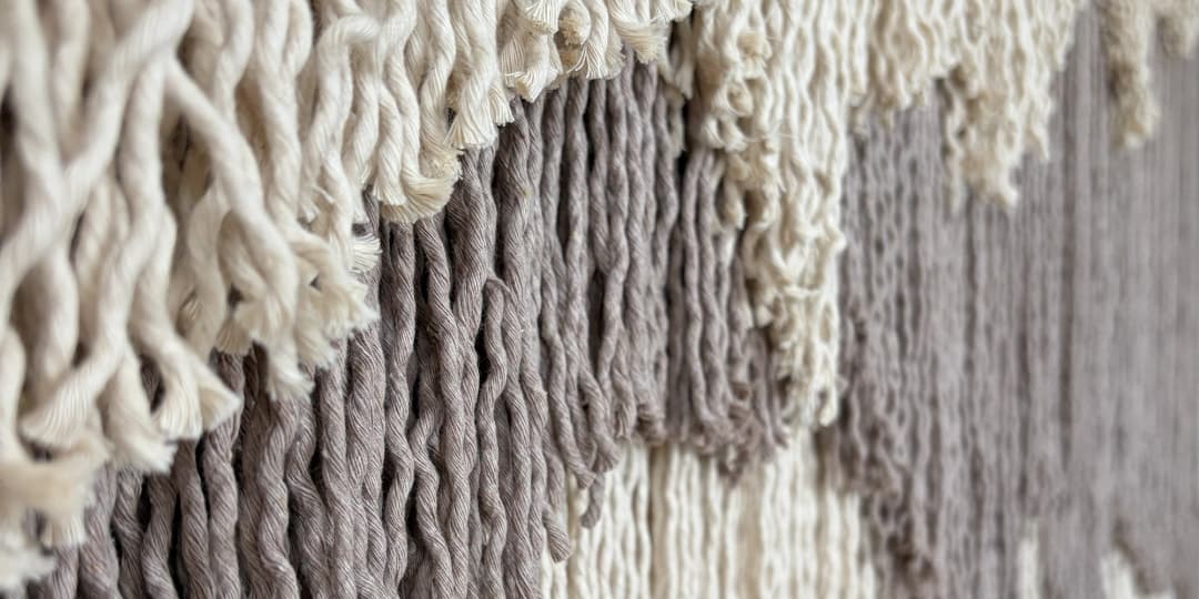 Close up macro shot of Mountain textured fiber wall art.