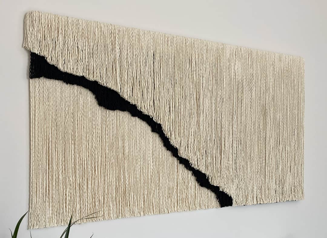 Left-angle view of the textured wall art titled Fault Line.