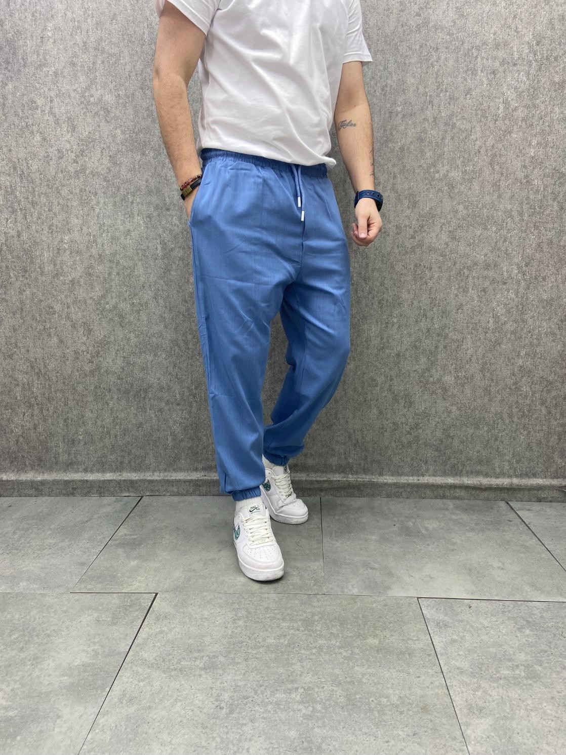 Rahat Kalıp Bel ve Paça Lastikli Pamuk Dokuma Mavi  Jogger