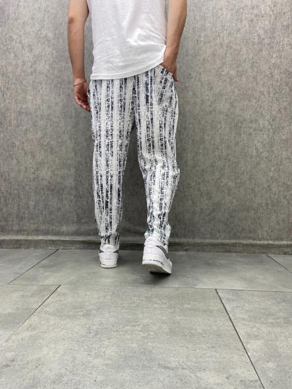Beli Lastikli Düz Paça Desenli Baggy Pantolon