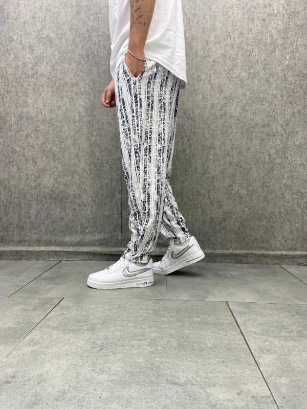 Beli Lastikli Düz Paça Desenli Baggy Pantolon