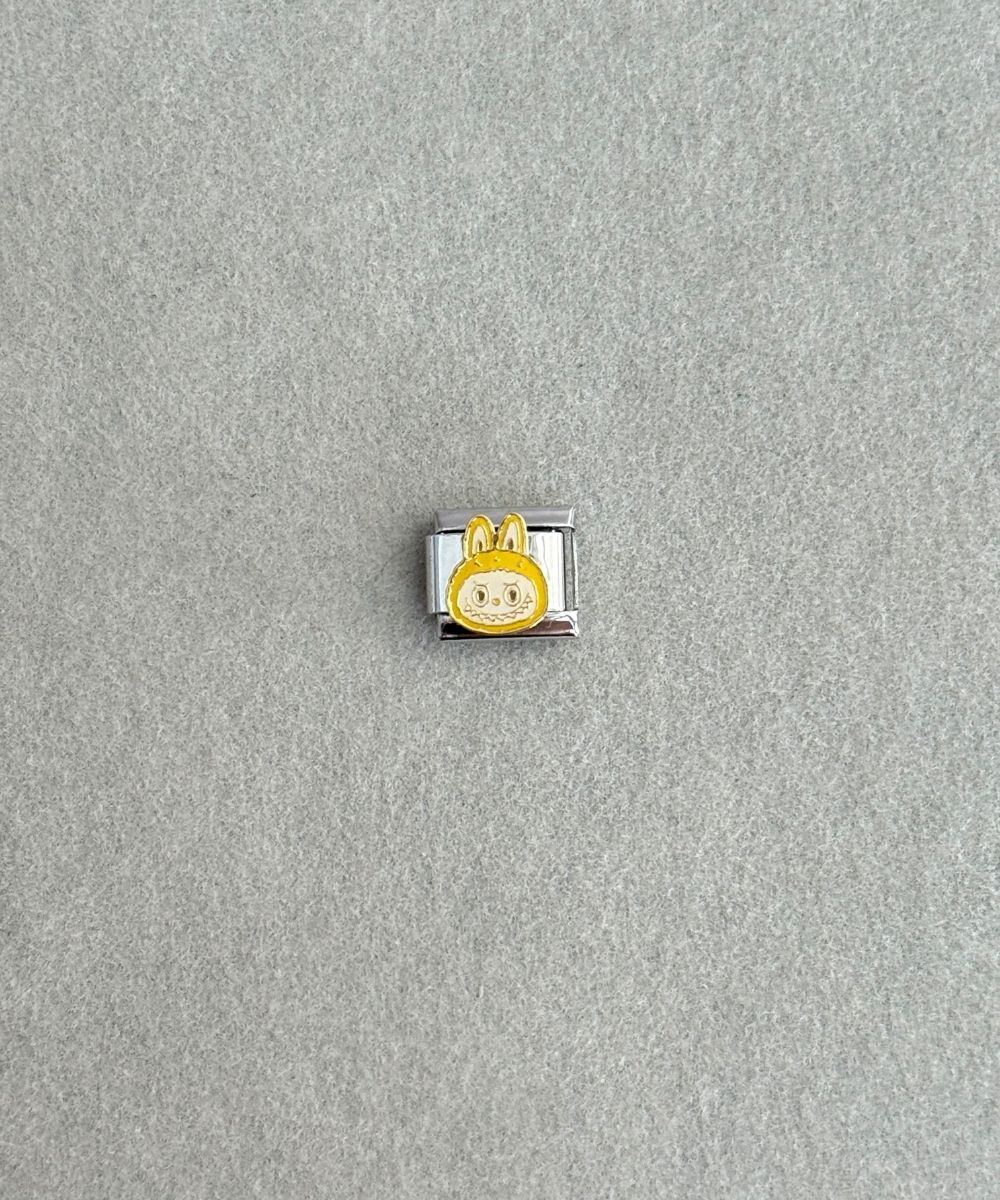 Nomi Sarı Labu Charm