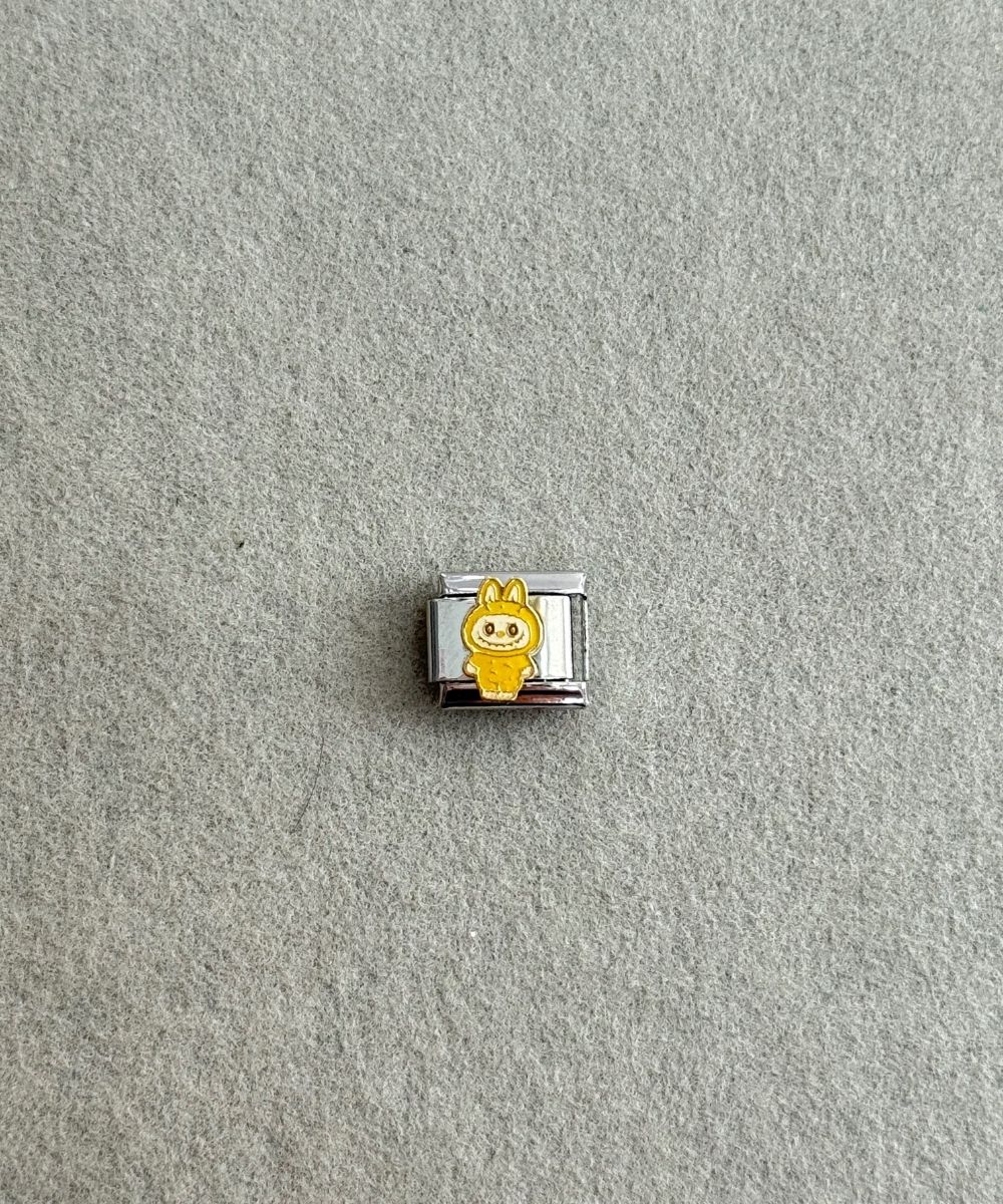 Nomi Sarı Labu Charm