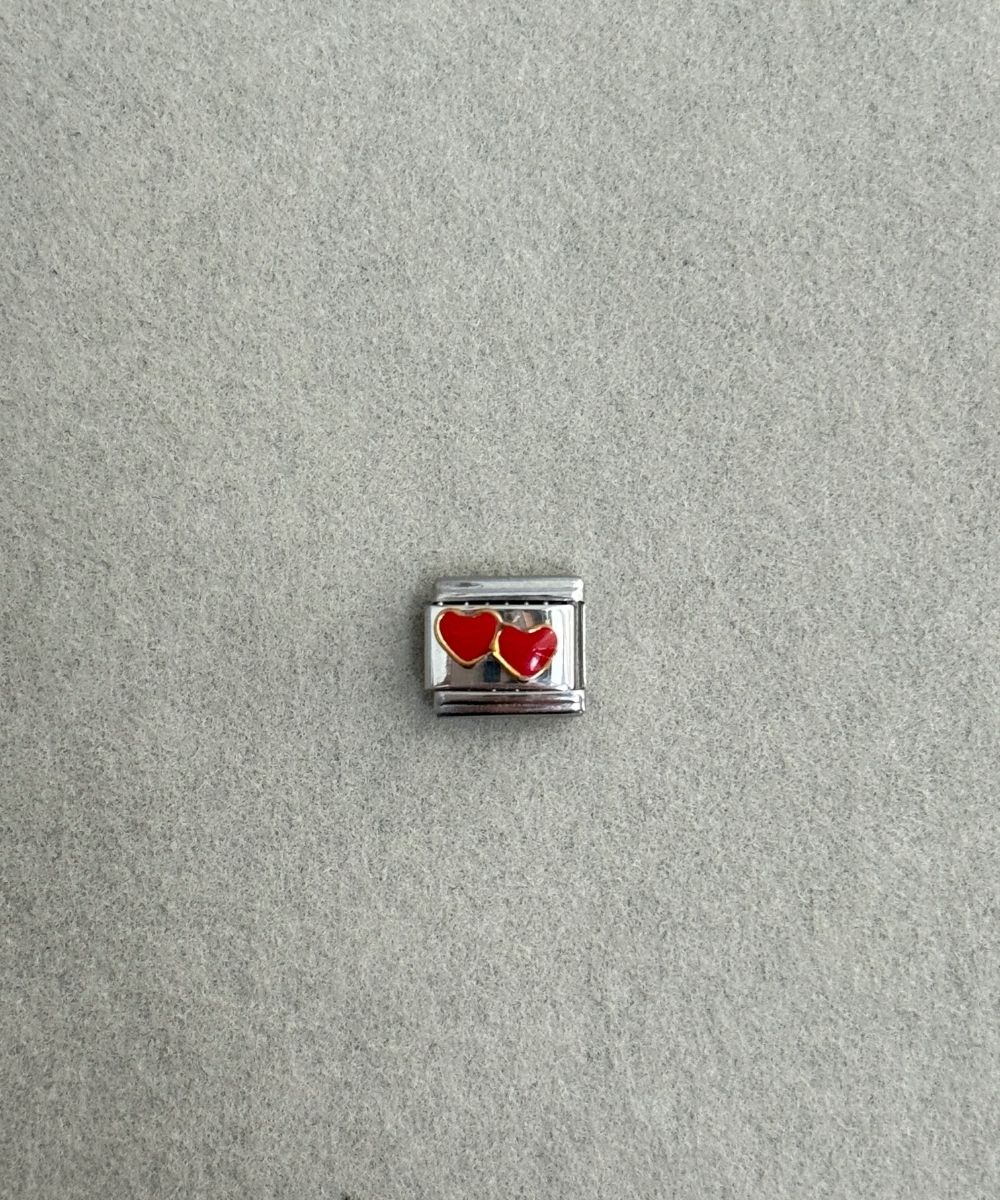 Nomi Kalp Charm