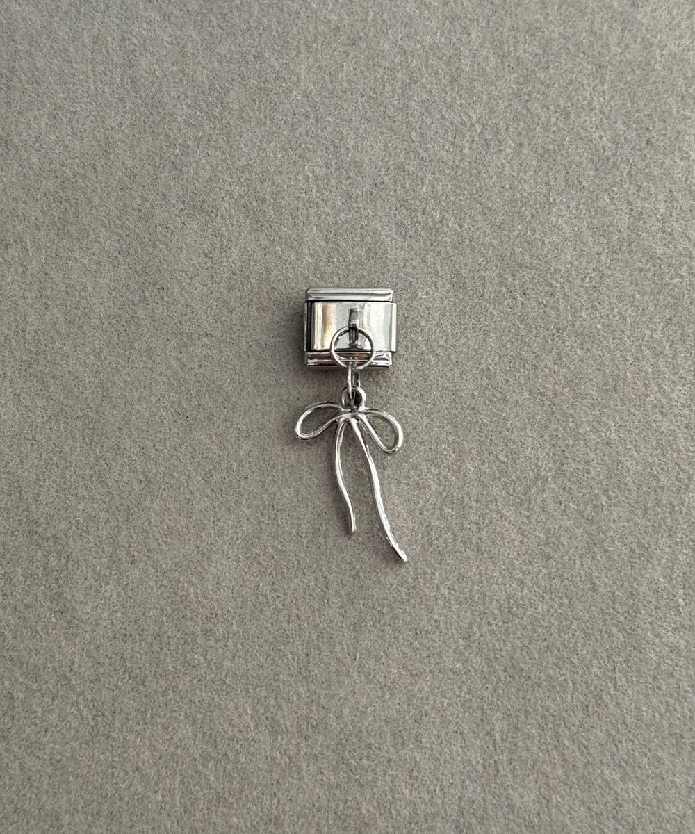 Nomi Kurdele Sallantılı Charm