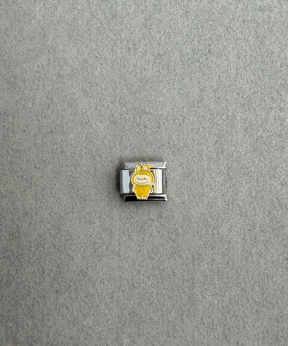 Nomi Sarı Labu Charm