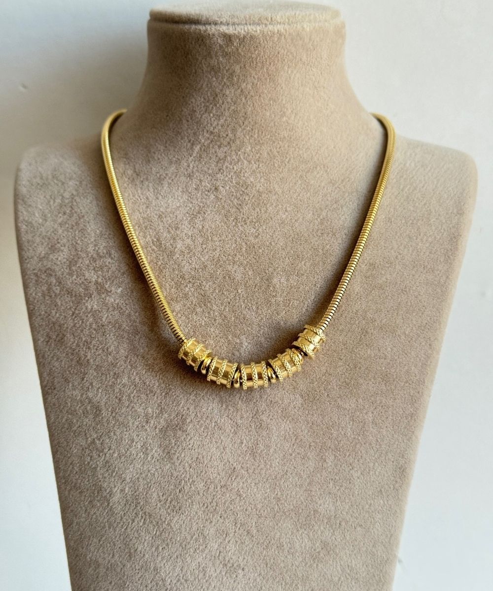 Çelik Sıralı Silindir Gold Kolye