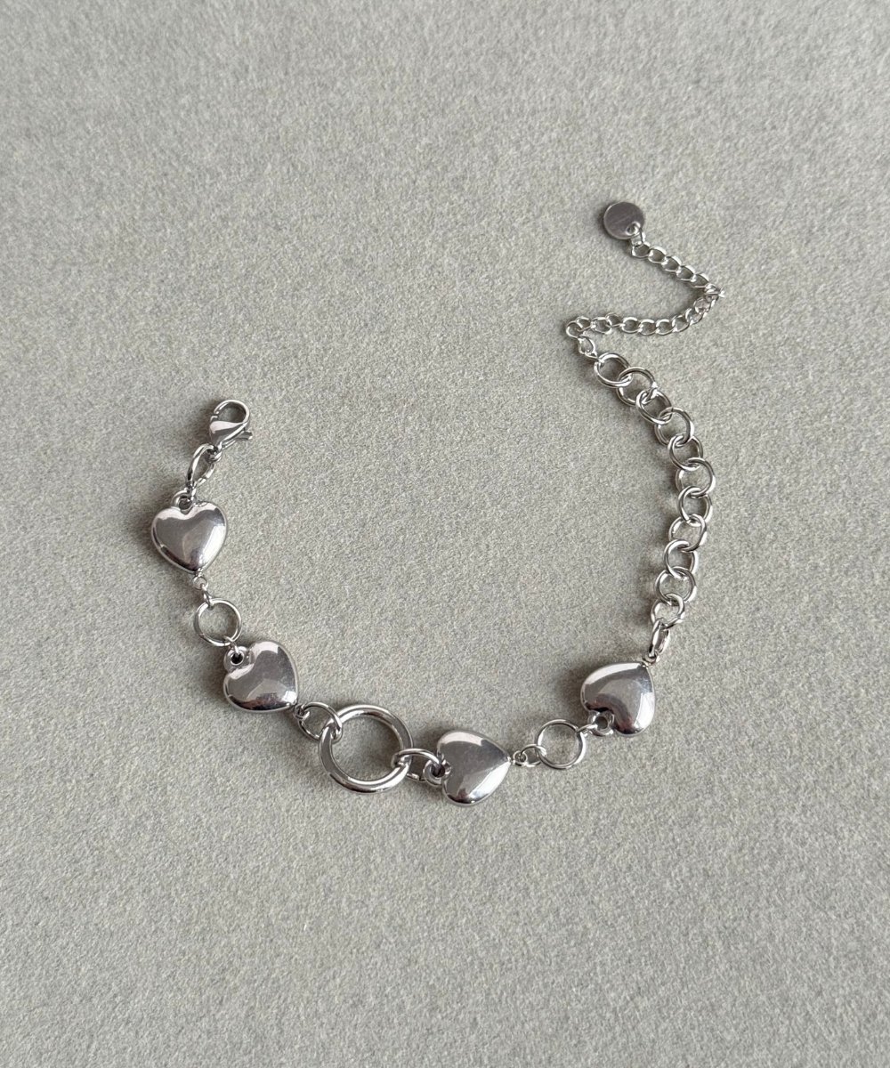 Çelik Kalp Sıralı Bileklik