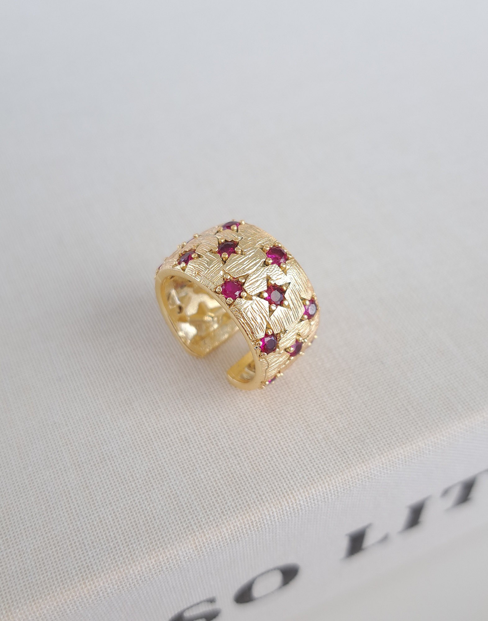 Textured Gold Ring with Red Stones