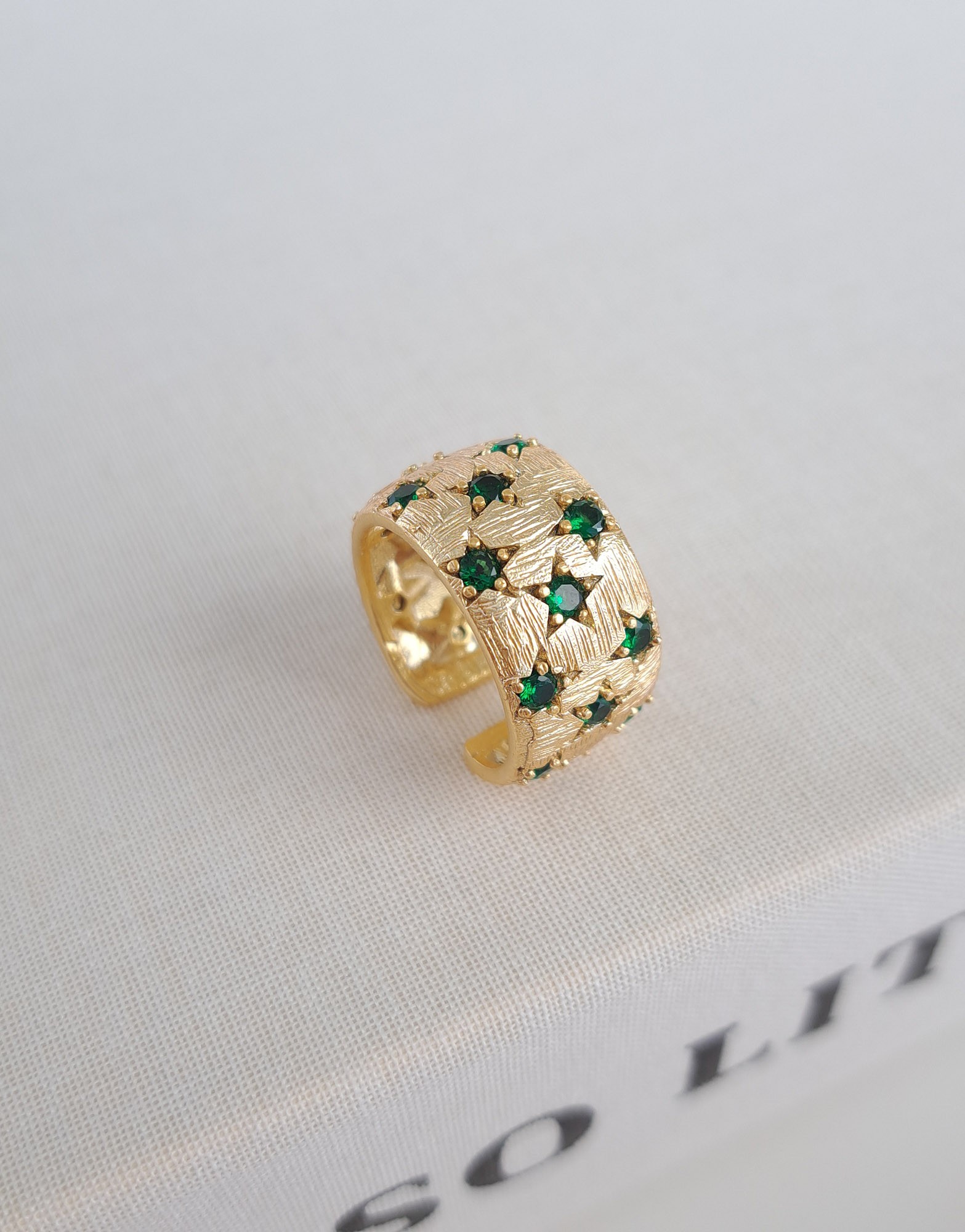 Textured Gold Ring with Green Stones