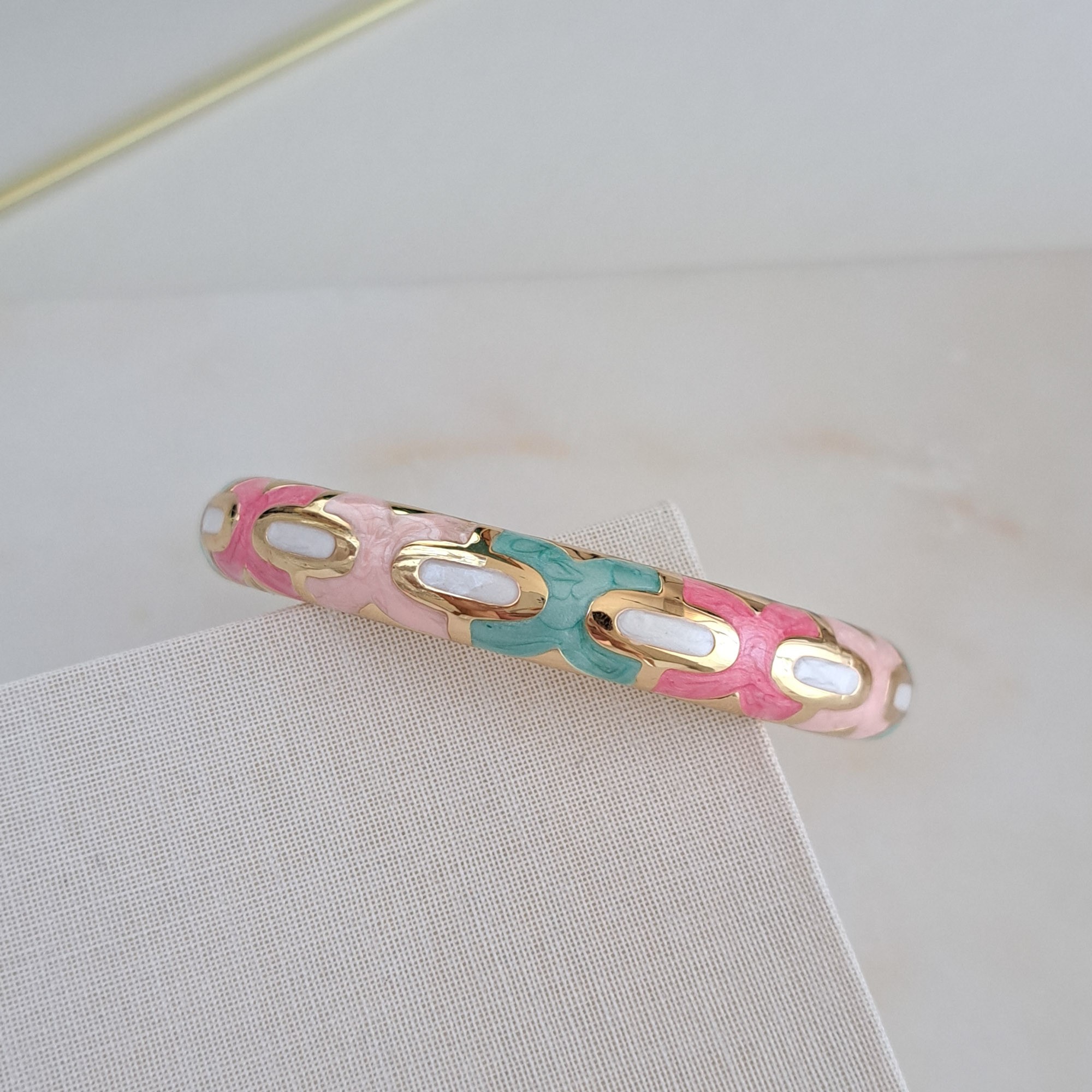 Bangle bracelet in white, pink, blue, and pearl tones