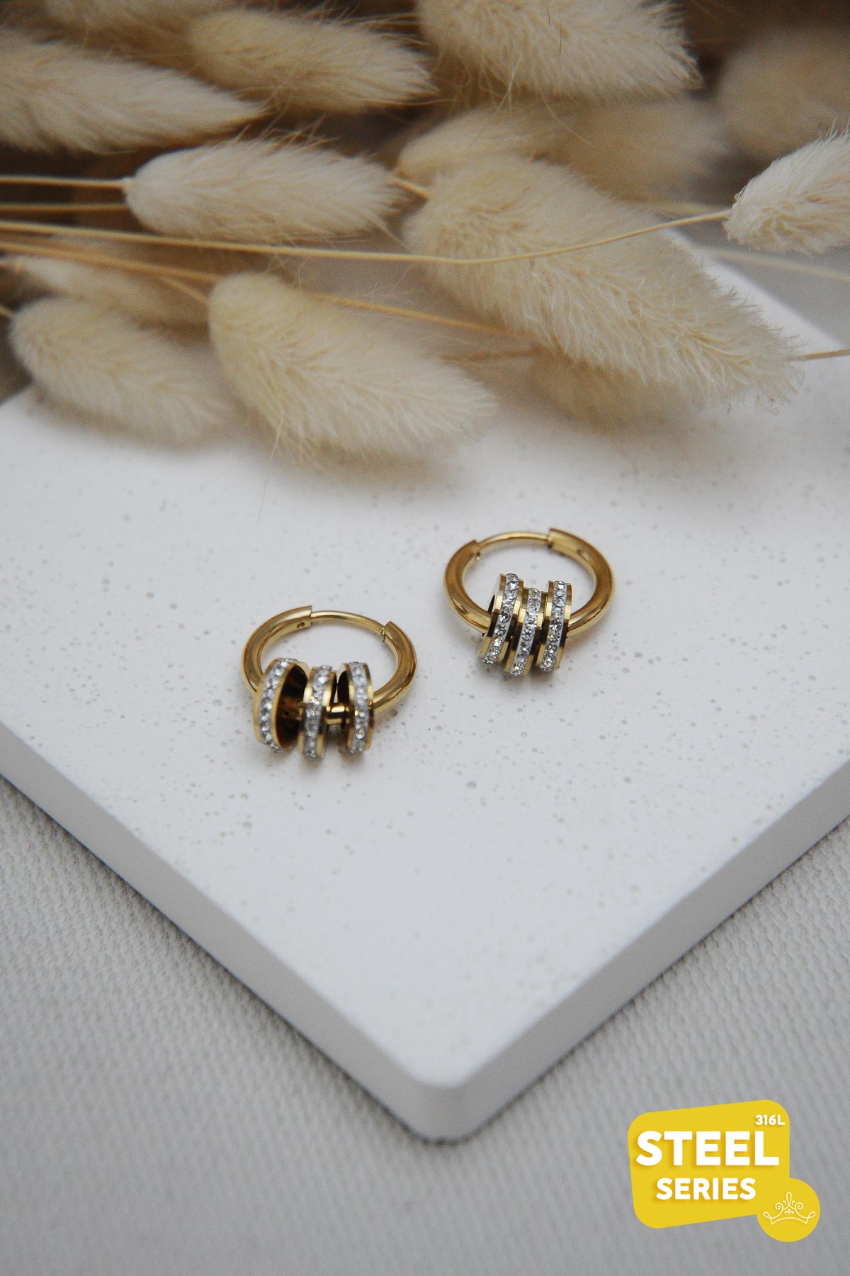 Zirkon Silindir Sallantılı Gold Halka Çelik Küpe AKE4795