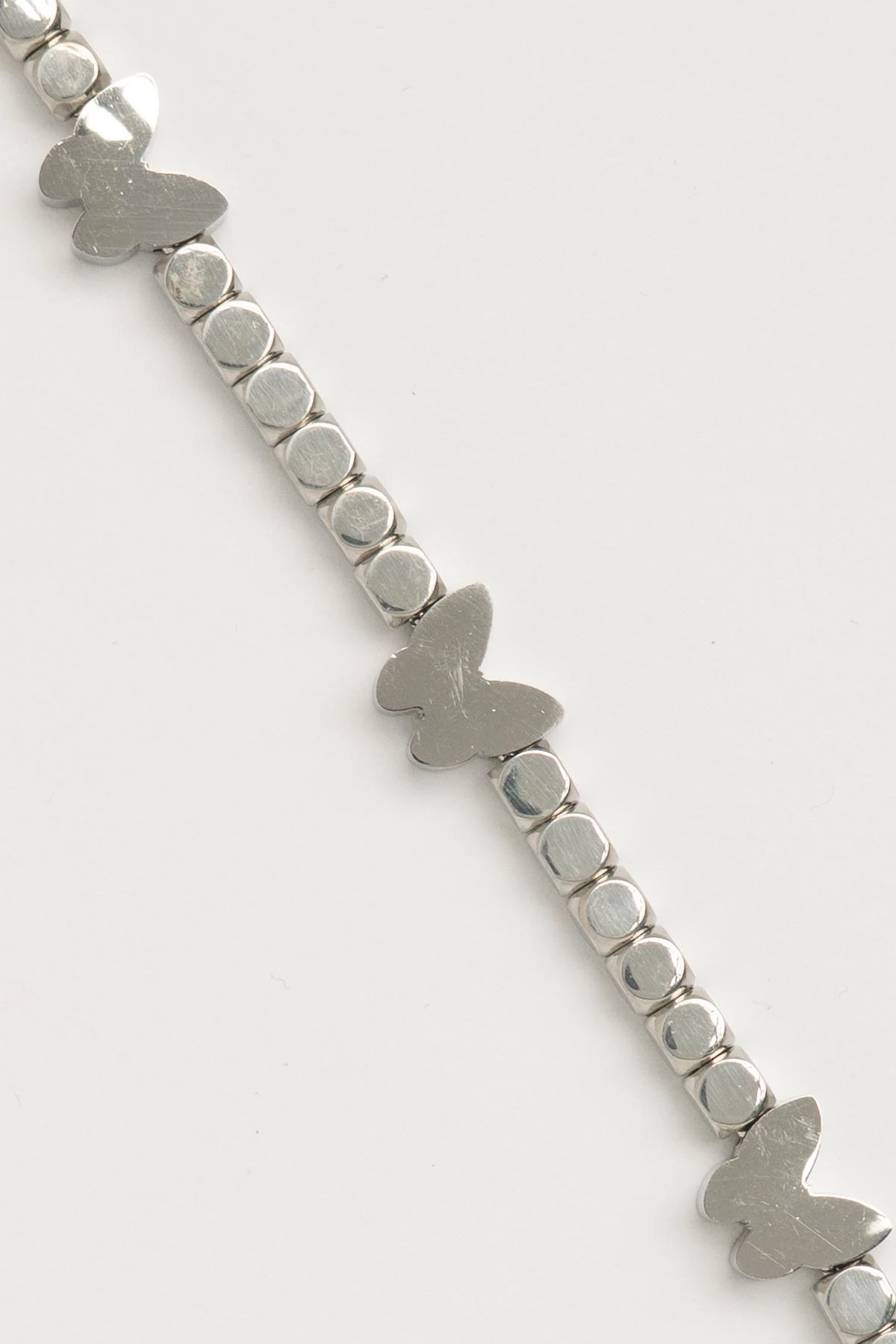 Silver Dolgulu Kelebek Detay Sıra Küpler Çelik Bileklik ABL7214