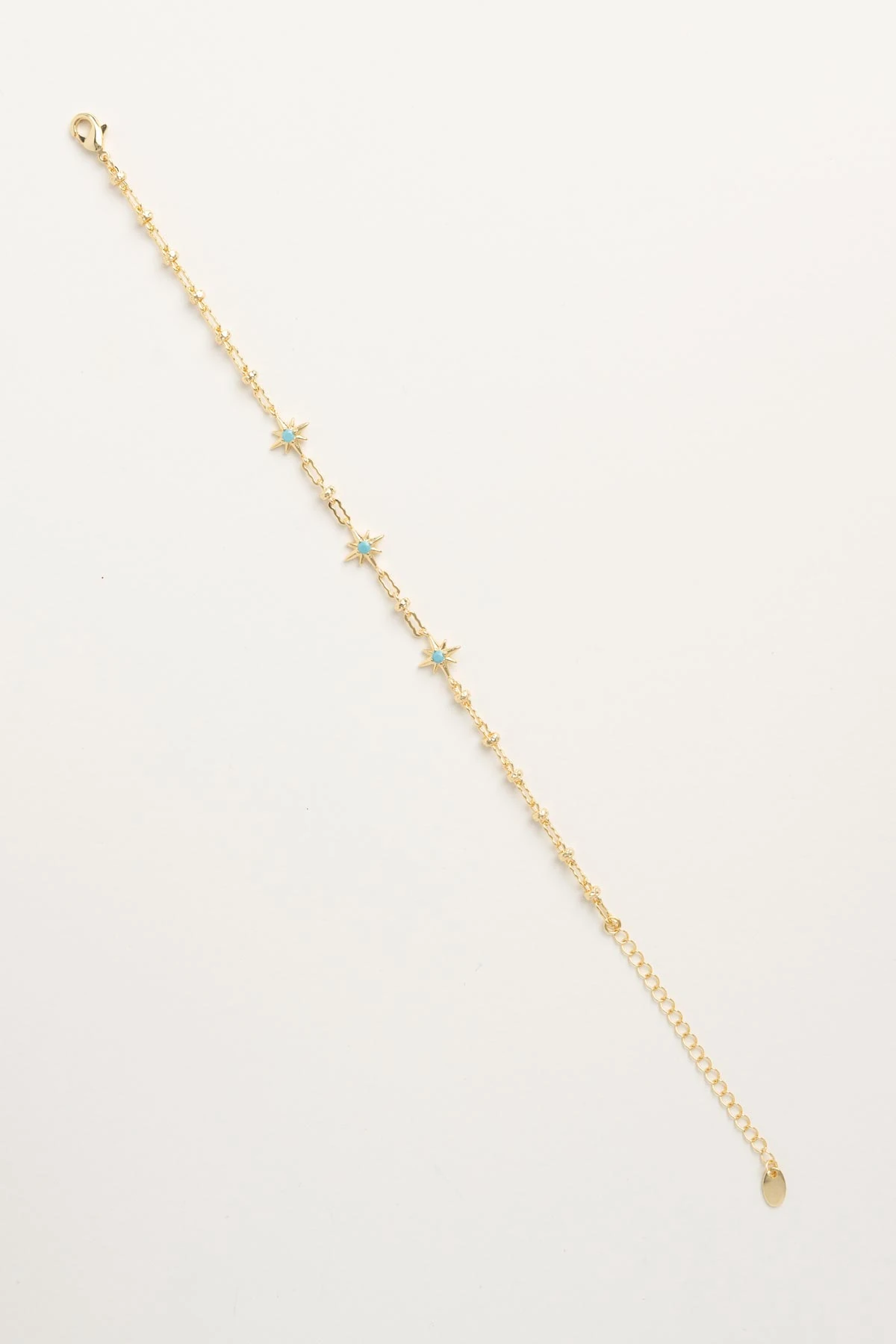 Gold Desenli Zincir Turkuaz Taş Detay Mini Kuzey Yıldızı Sıralı Luxury Bileklik ABL7605