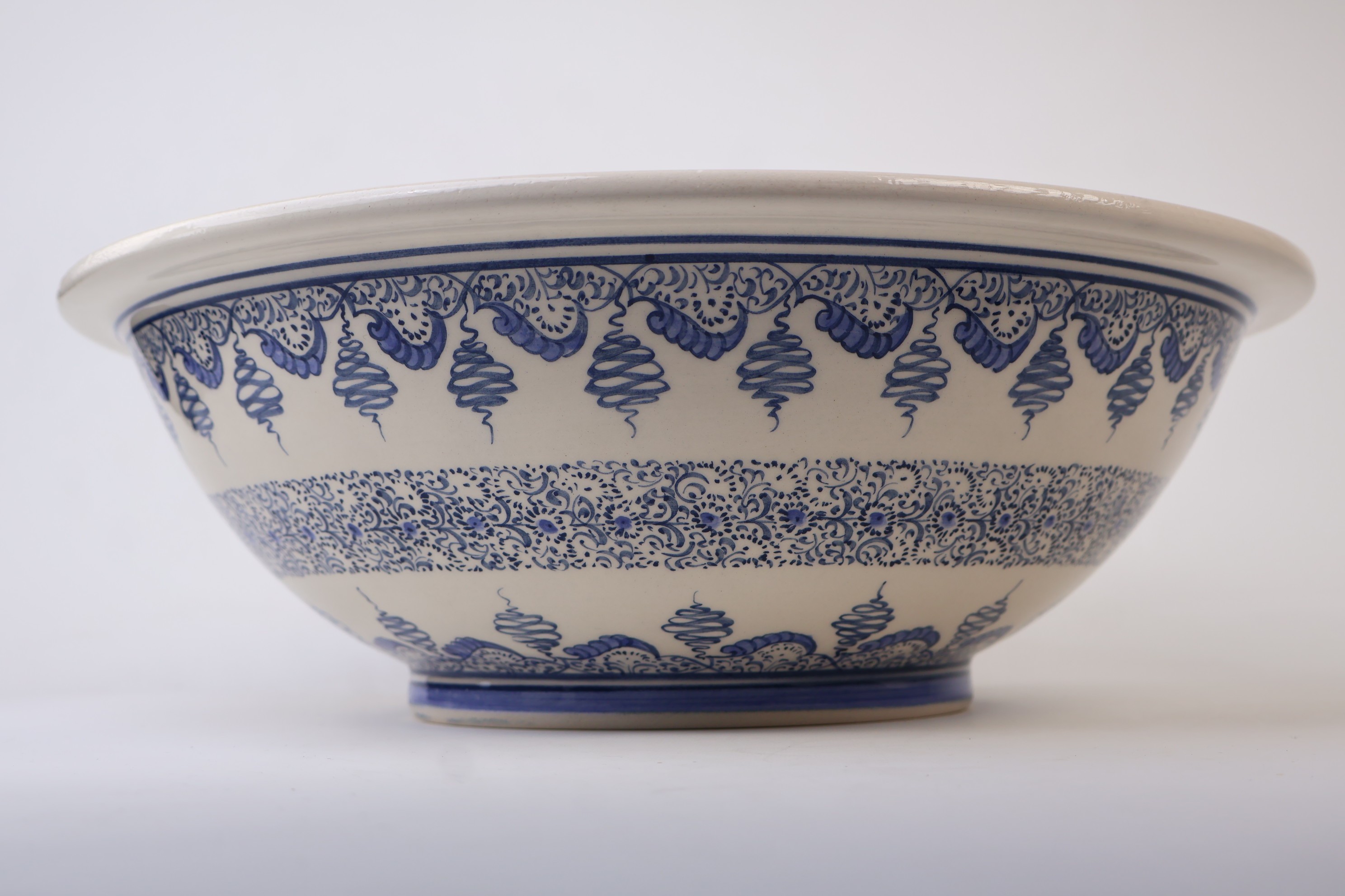 Artisan Crafted Ceramic Sink with Blue Golden Horn Patterns