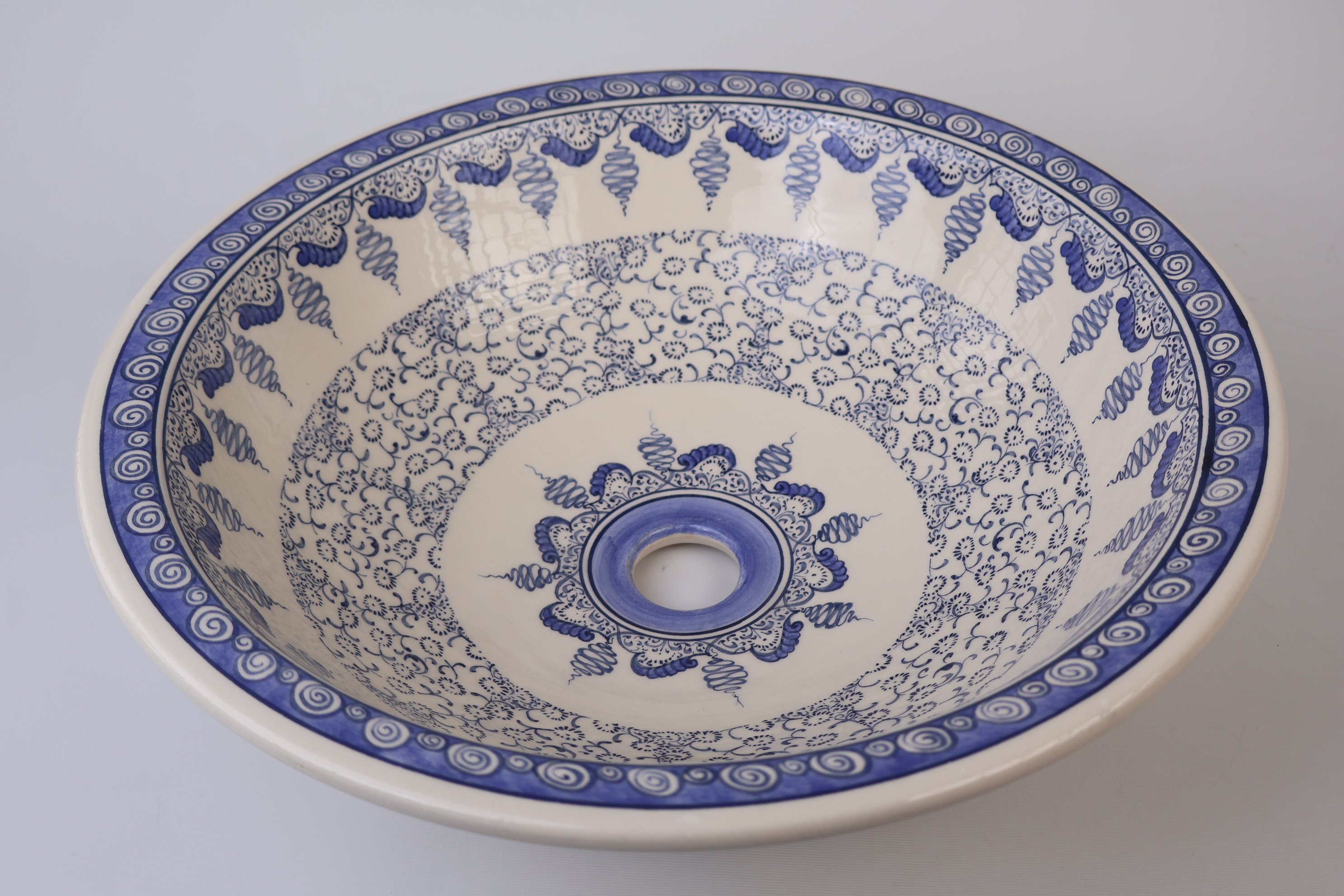 Artisan Crafted Ceramic Sink with Blue Golden Horn Patterns