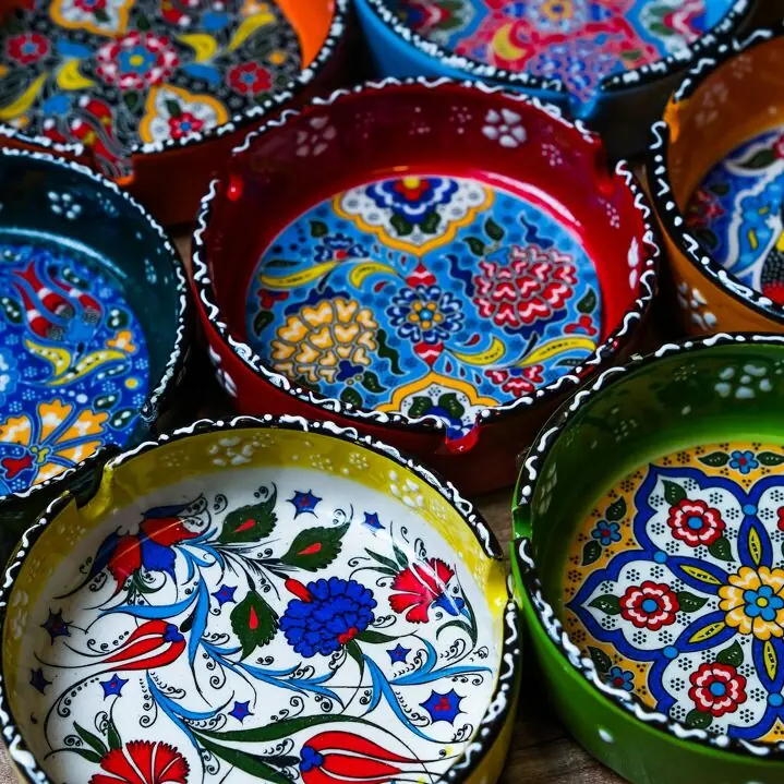 Hand-Painted Ceramic Ashtrays with Embossed Floral Designs in