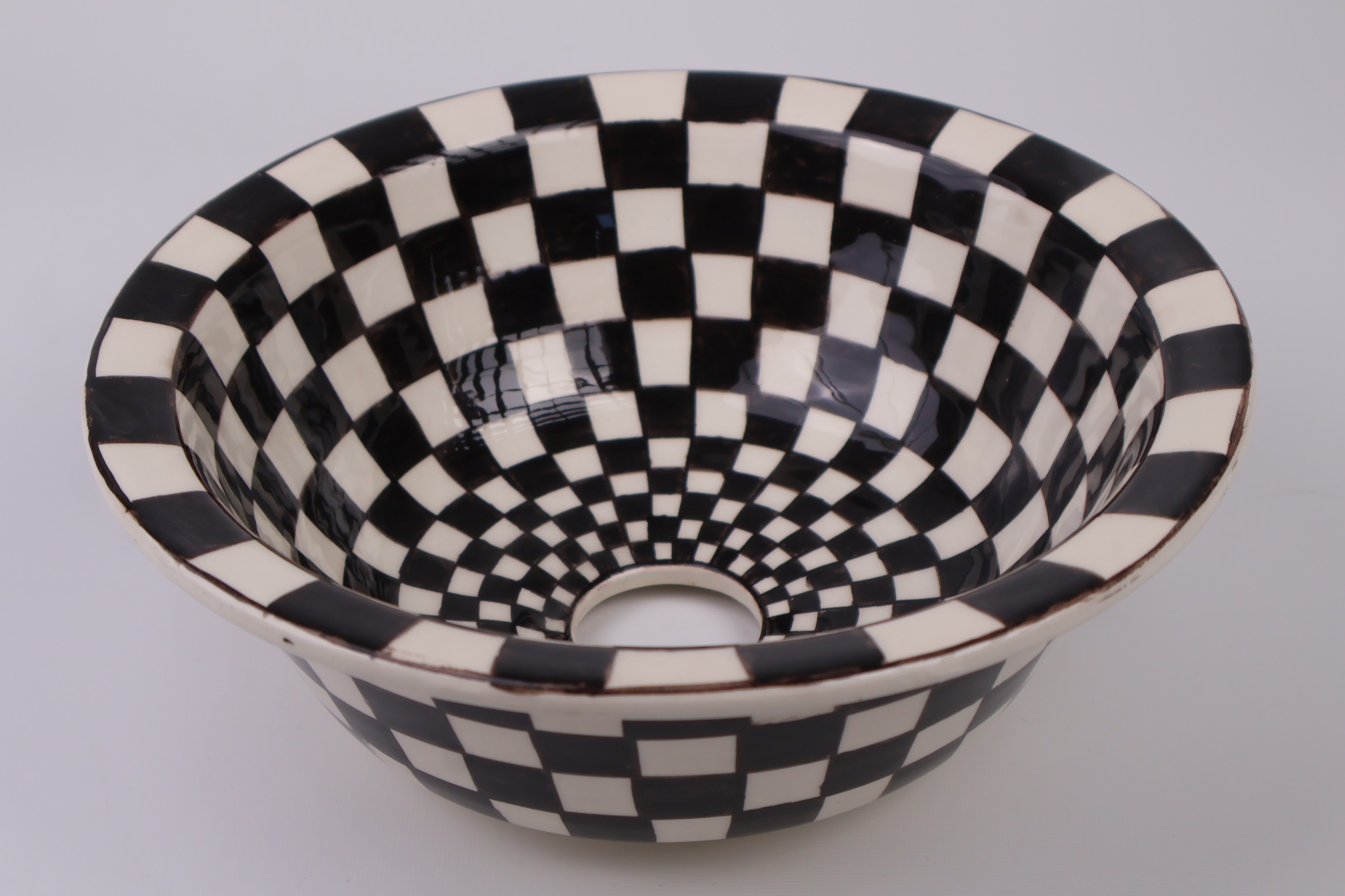 Artisan Crafted Ceramic Sink with Black And White Checkered Pattern