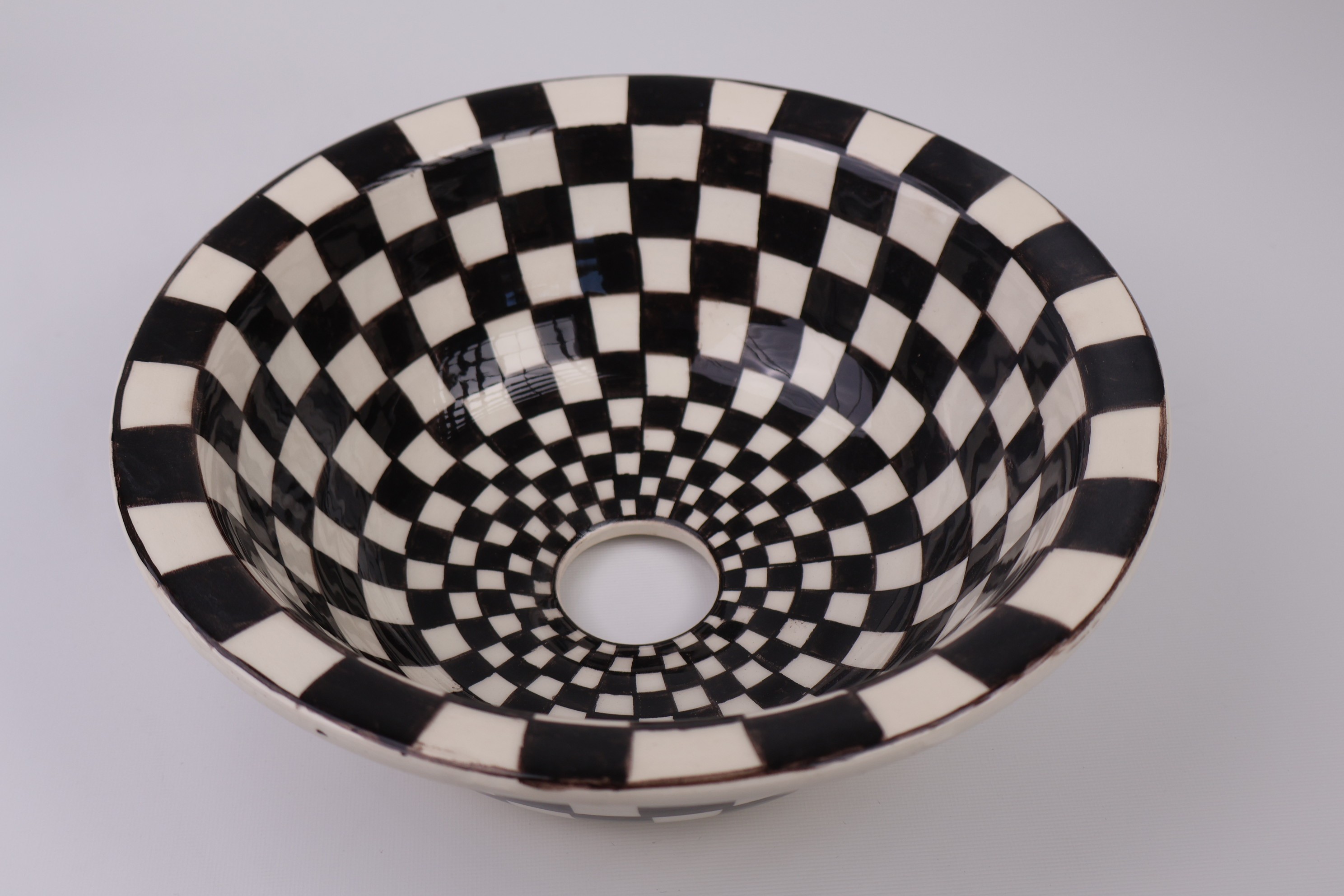 Artisan Crafted Ceramic Sink with Black And White Checkered Pattern