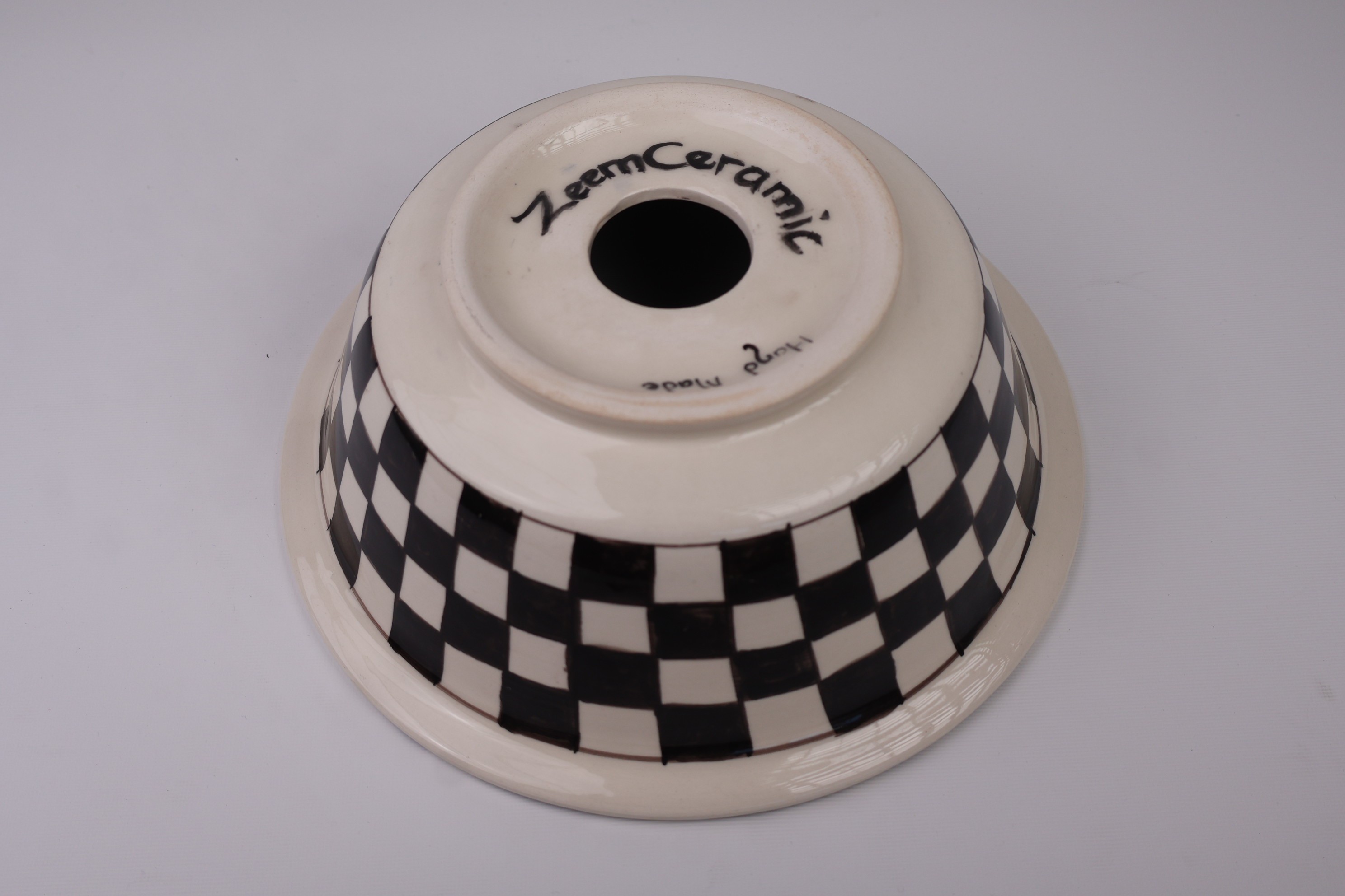 Artisan Crafted Ceramic Sink with Black And White Checkered Pattern