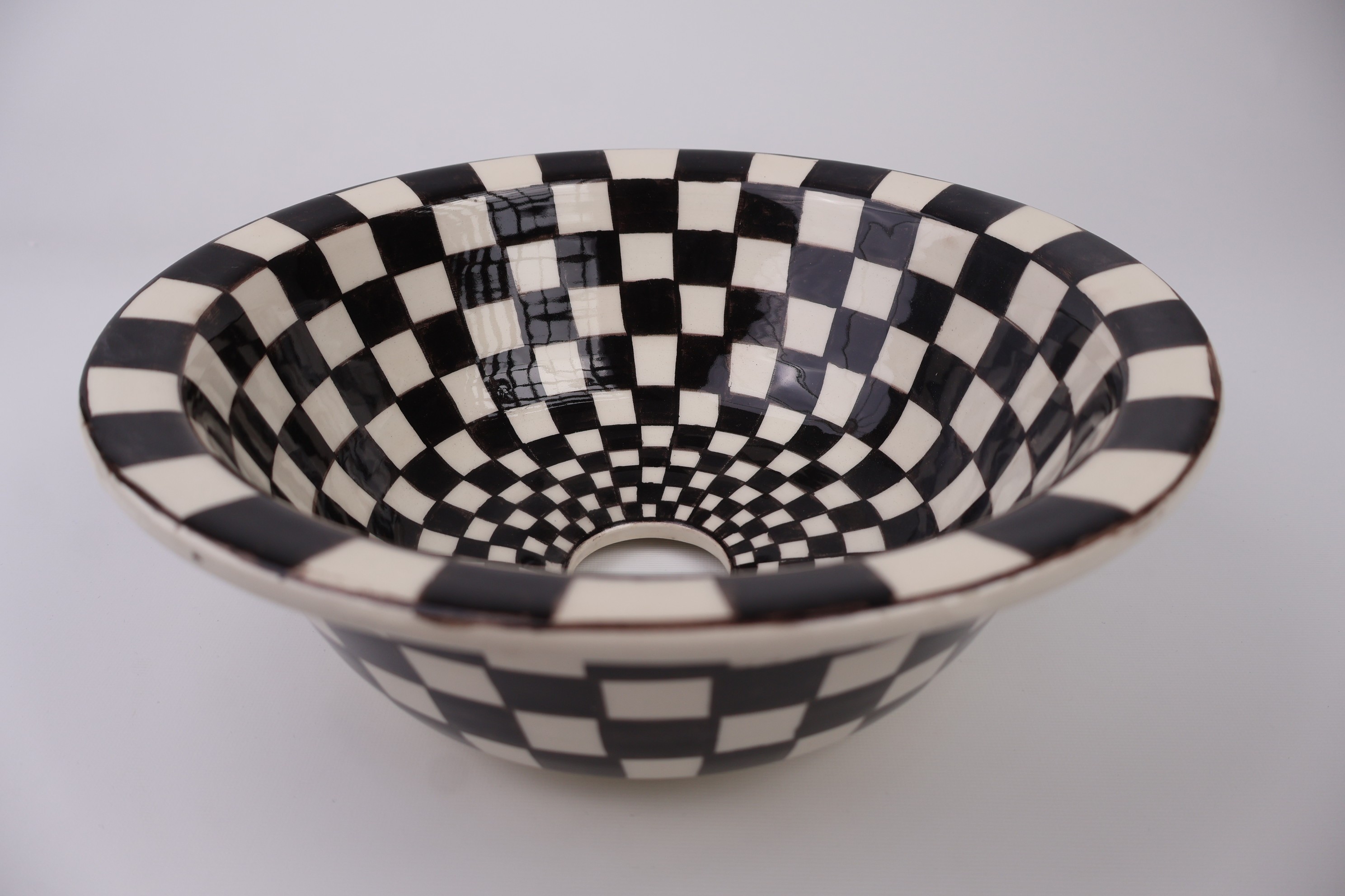 Artisan Crafted Ceramic Sink with Black And White Checkered Pattern