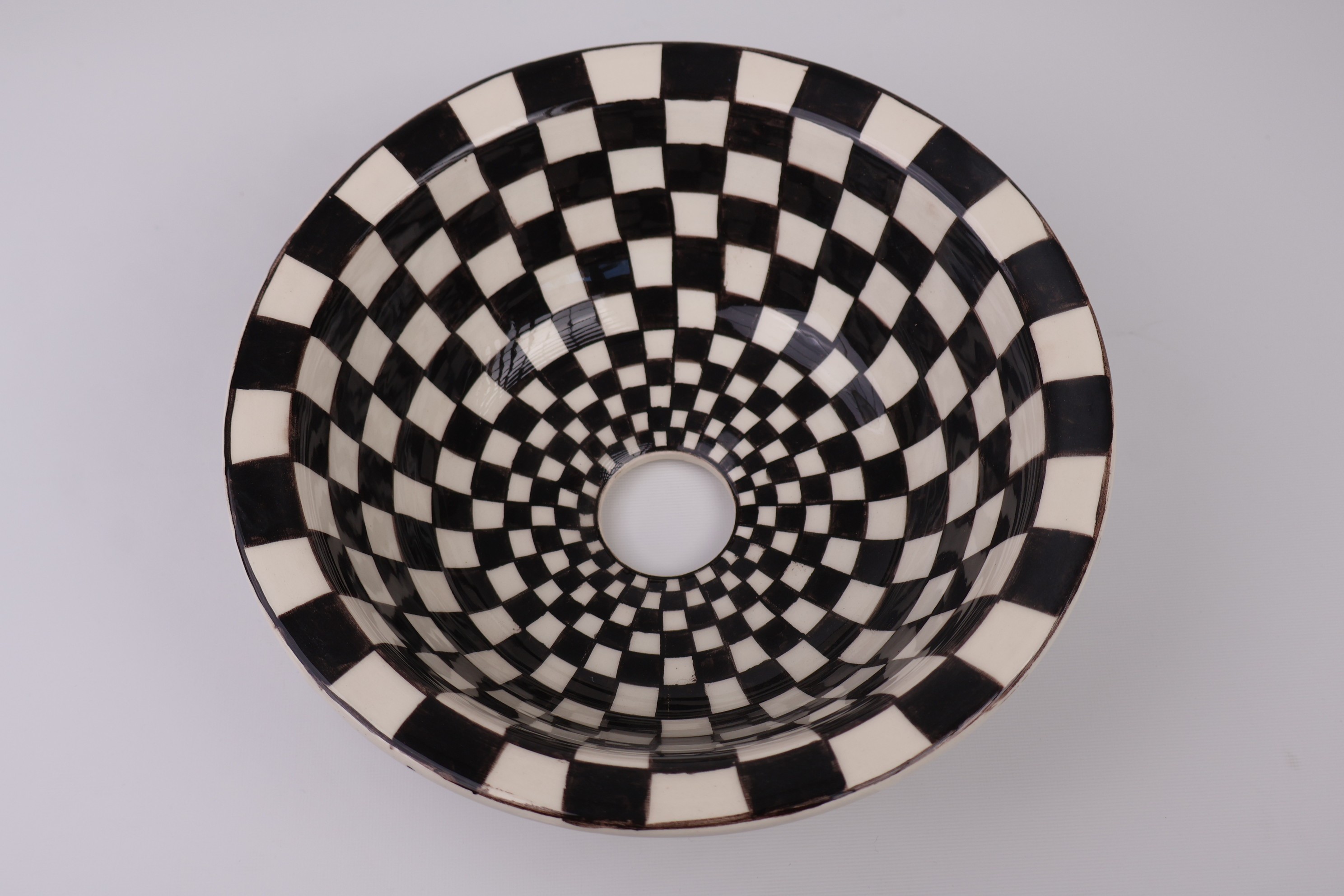 Artisan Crafted Ceramic Sink with Black And White Checkered Pattern