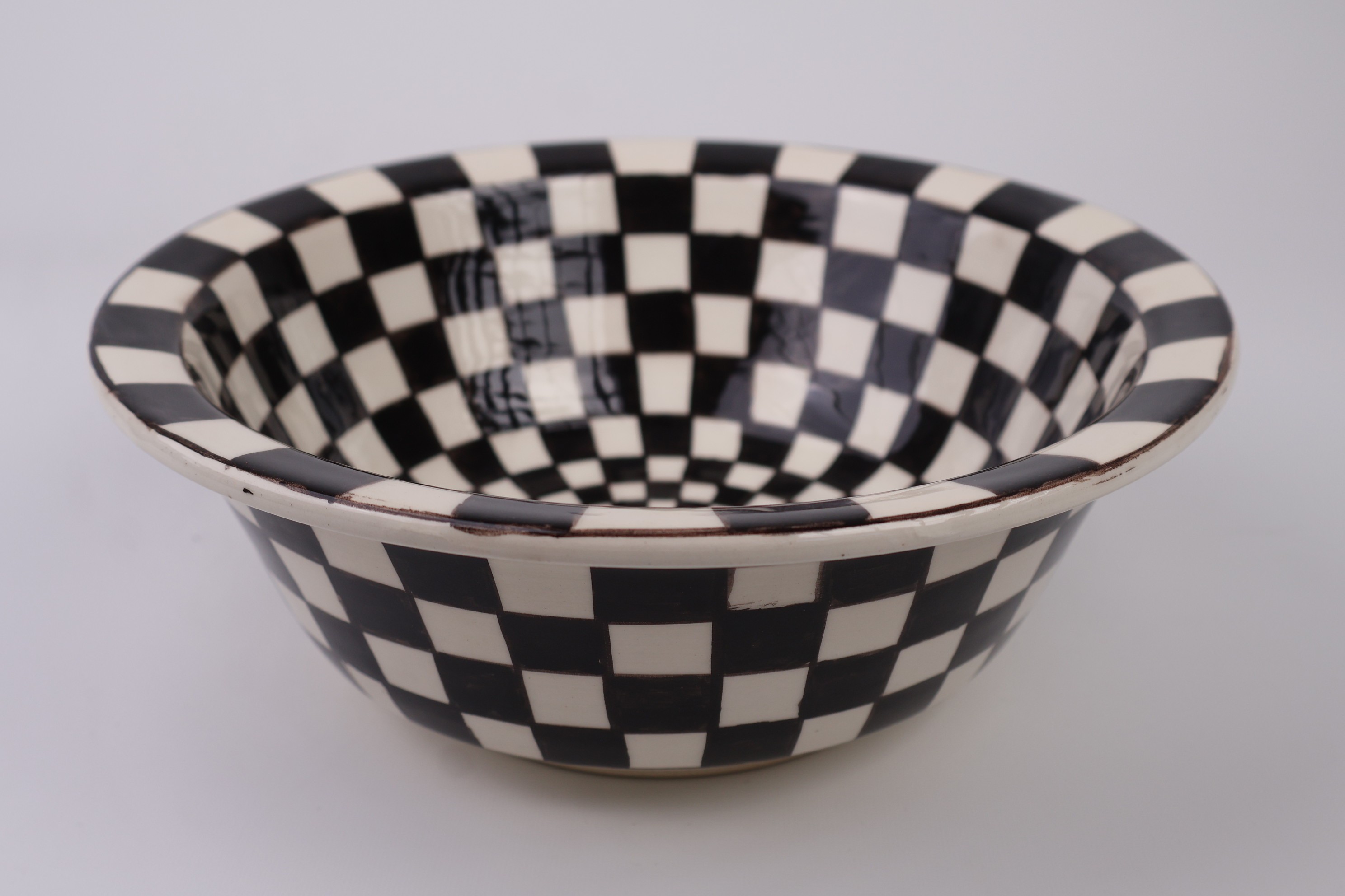 Artisan Crafted Ceramic Sink with Black And White Checkered Pattern