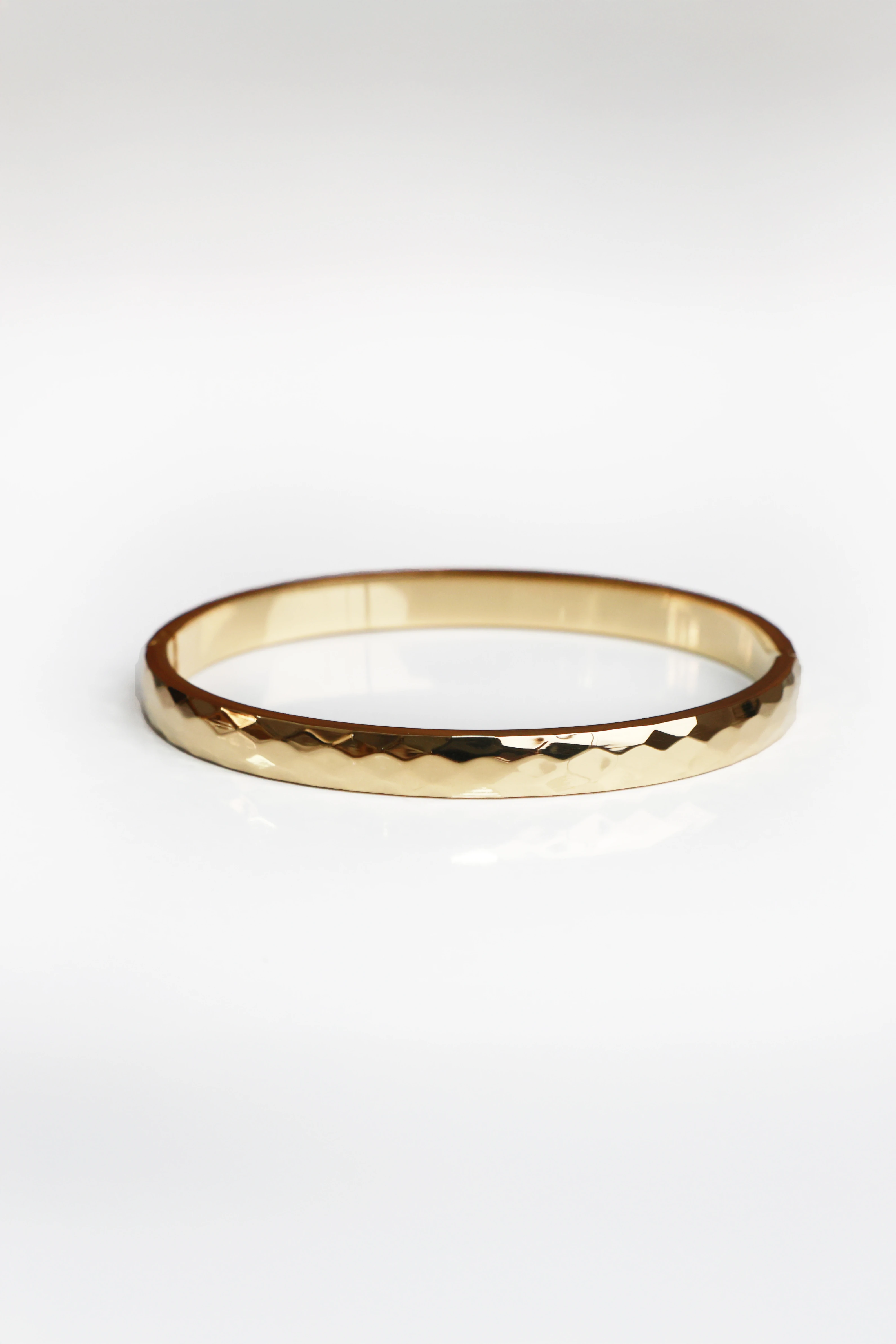 Sonche Asimetrik Altın Rengi Kelepçe 1060