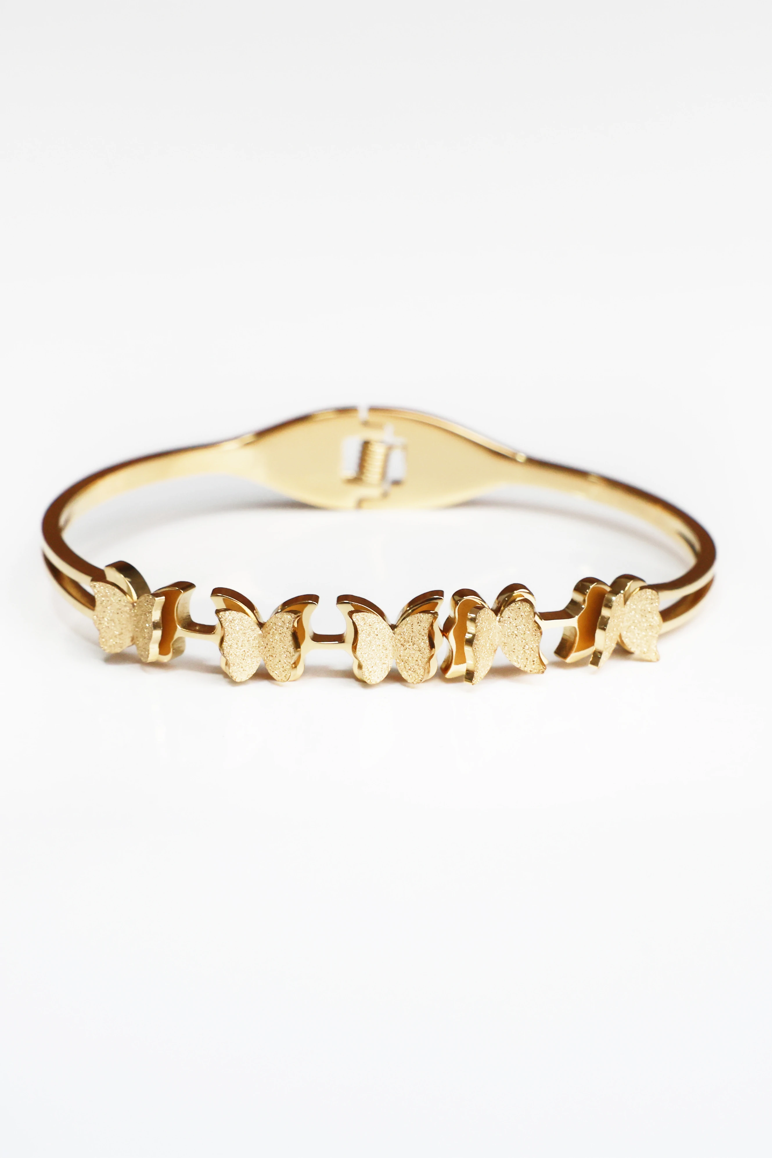 Sonche Kelebek Desenli Altın Rengi Kelepçe 1040