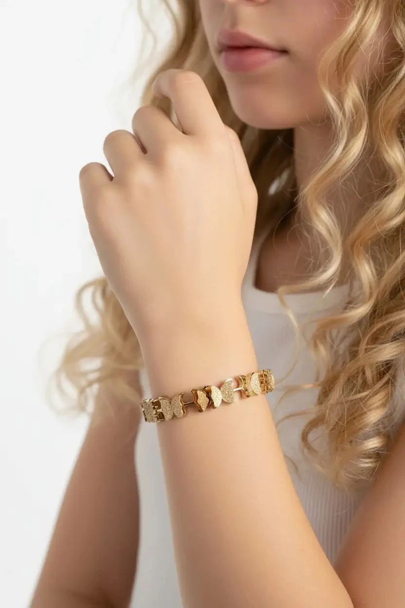 Sonche Kelebek Desenli Altın Rengi Kelepçe 1040