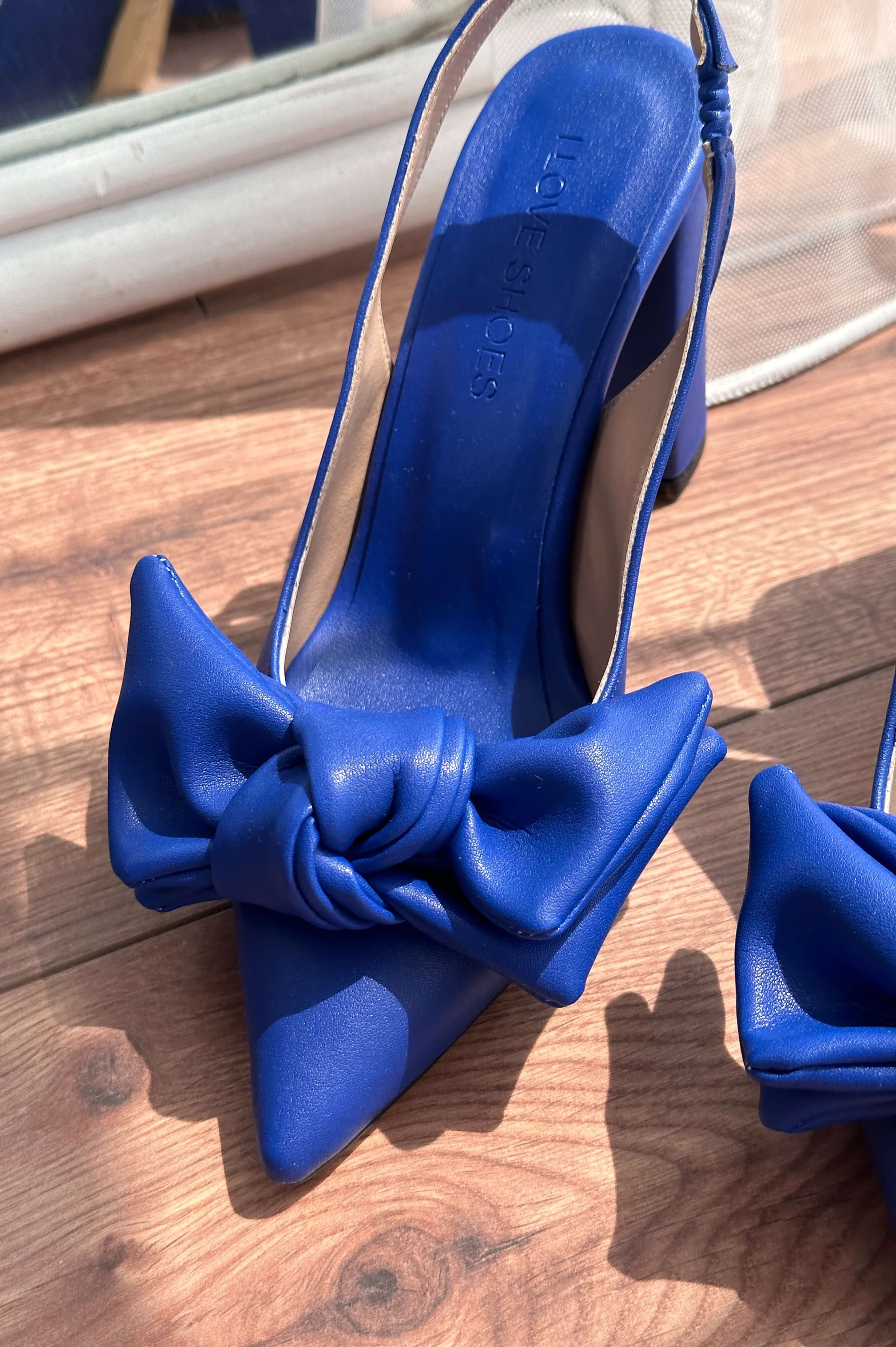 Colisna matte leather ribbon detailed female stiletto sax blue