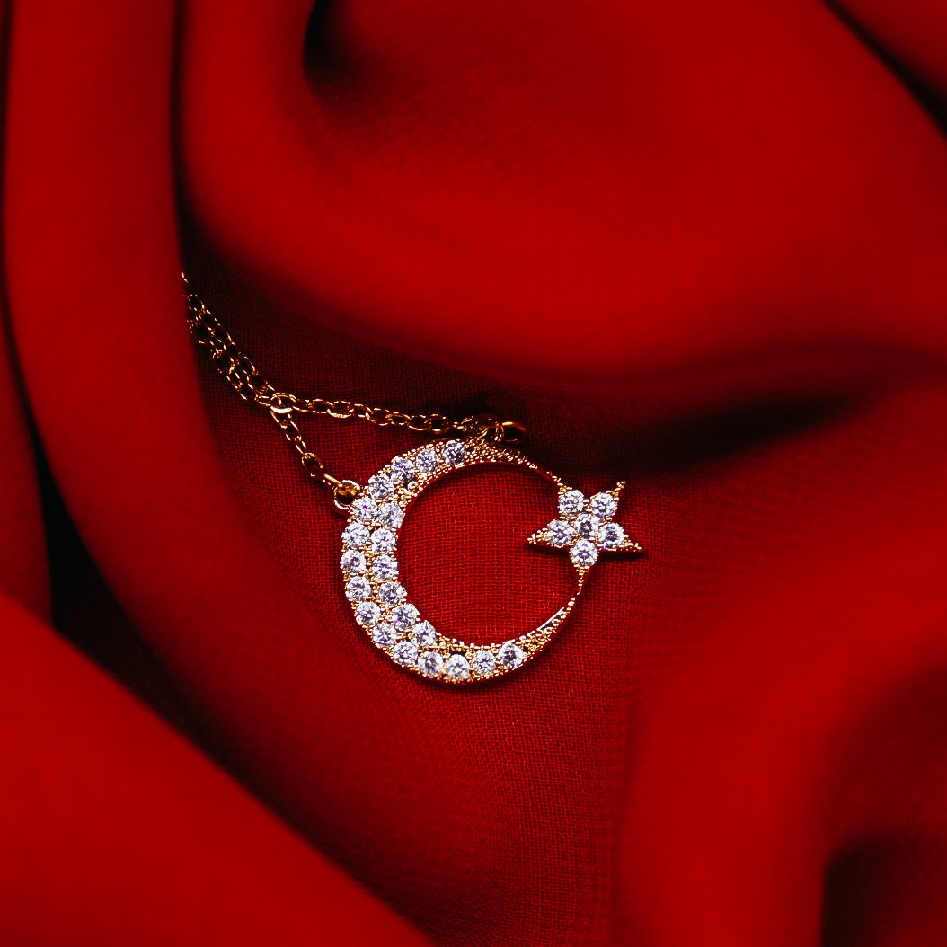 GOLD-PLATED MOON AND STAR NECKLACE