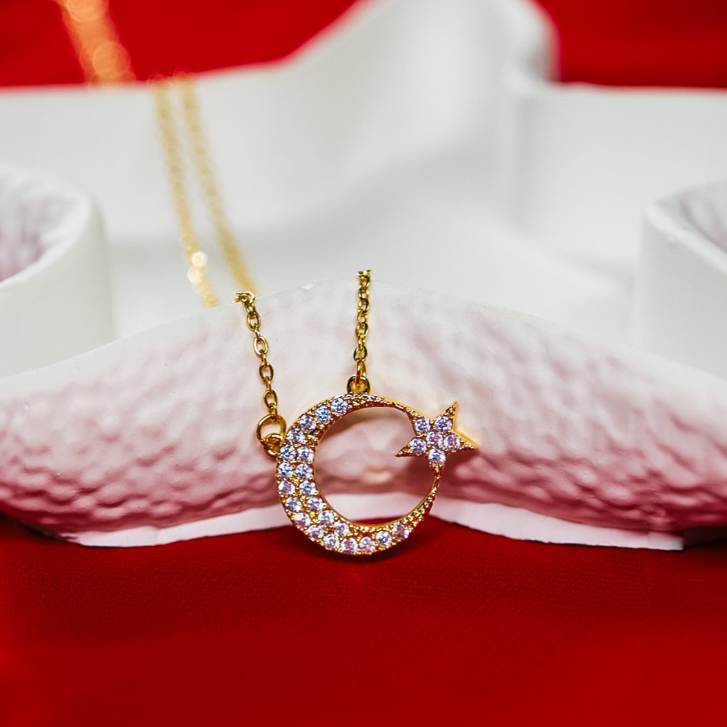 GOLD-PLATED MOON AND STAR NECKLACE