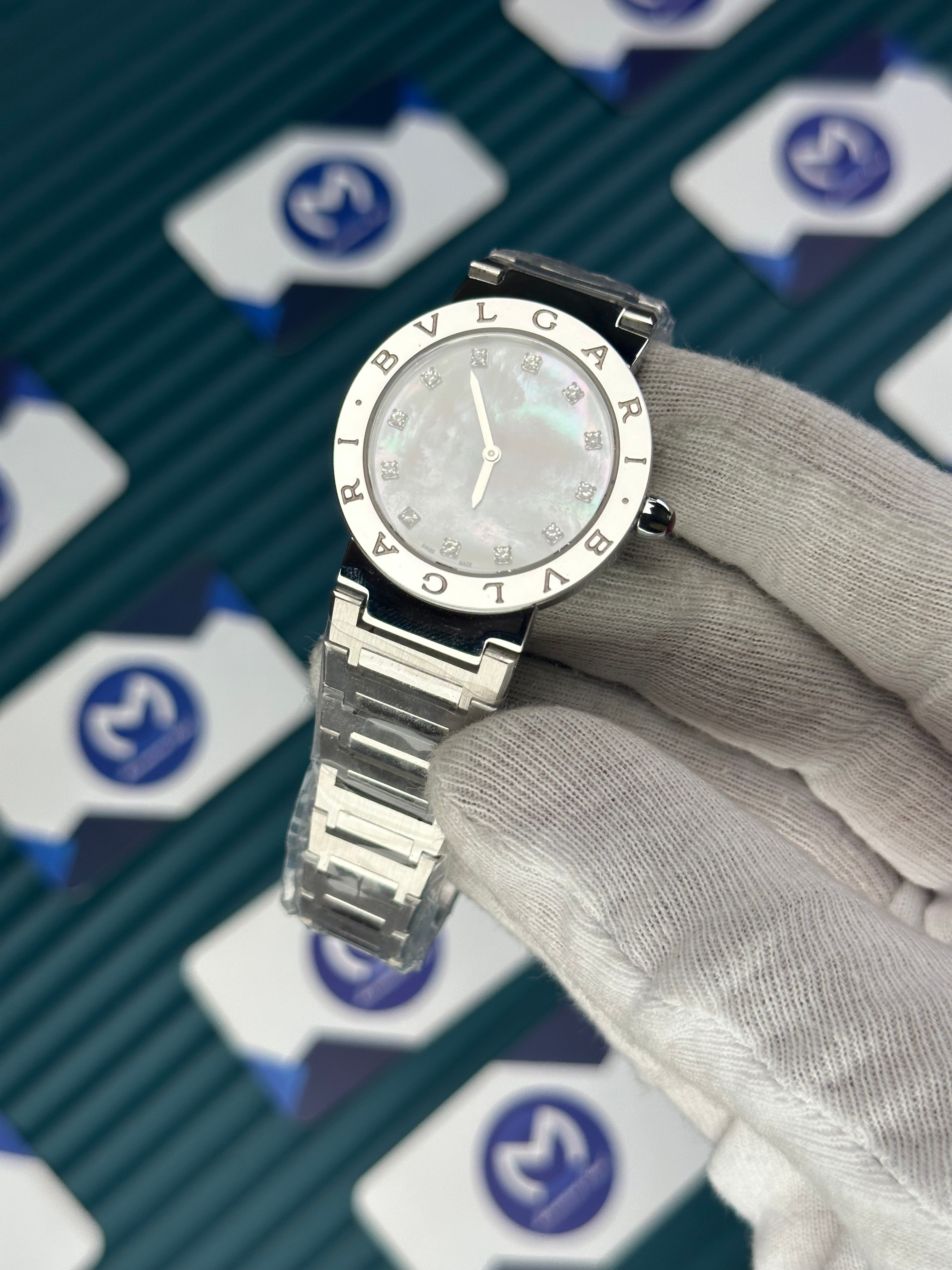 BVLGARI PEARLESCENT WHITE DIAL SILVER BEZEL DIAMOND INDEX SILVER CORD