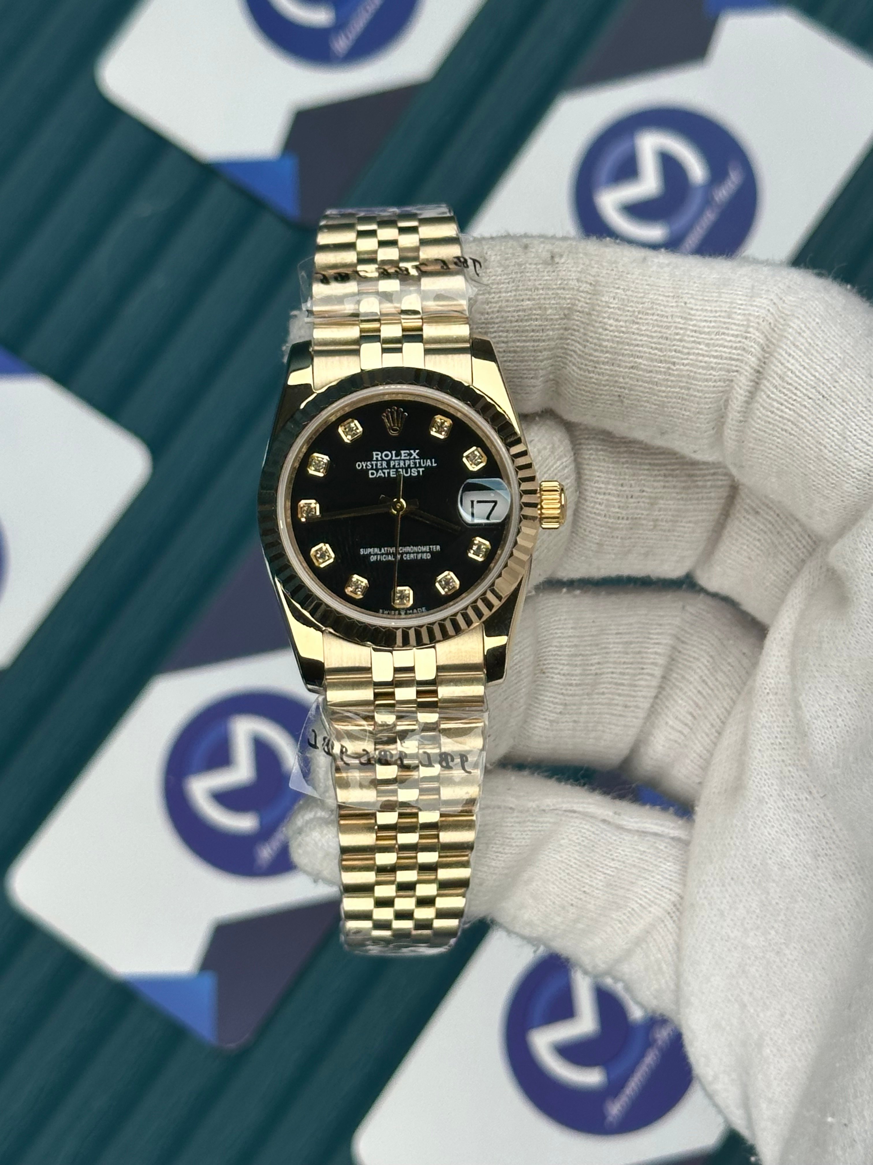 ROLEX 31 BLACK DIAL DIAMOND INDEX GOLD JUBILEE
