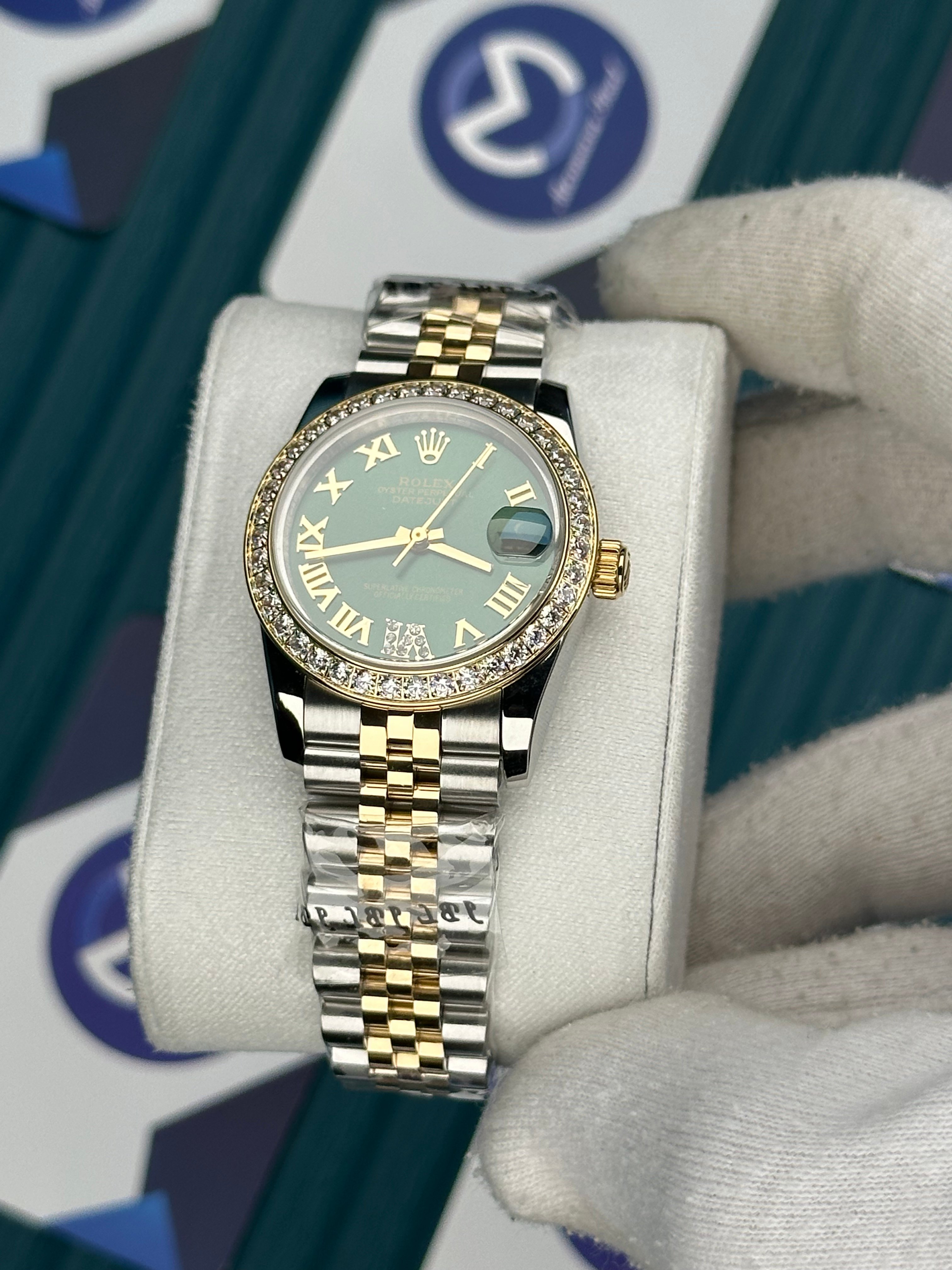 ROLEX 31 YEŞİL KADRAN ROMA INDEX PIRLANTA BEZEL GOLD-SILVER JUBILEE