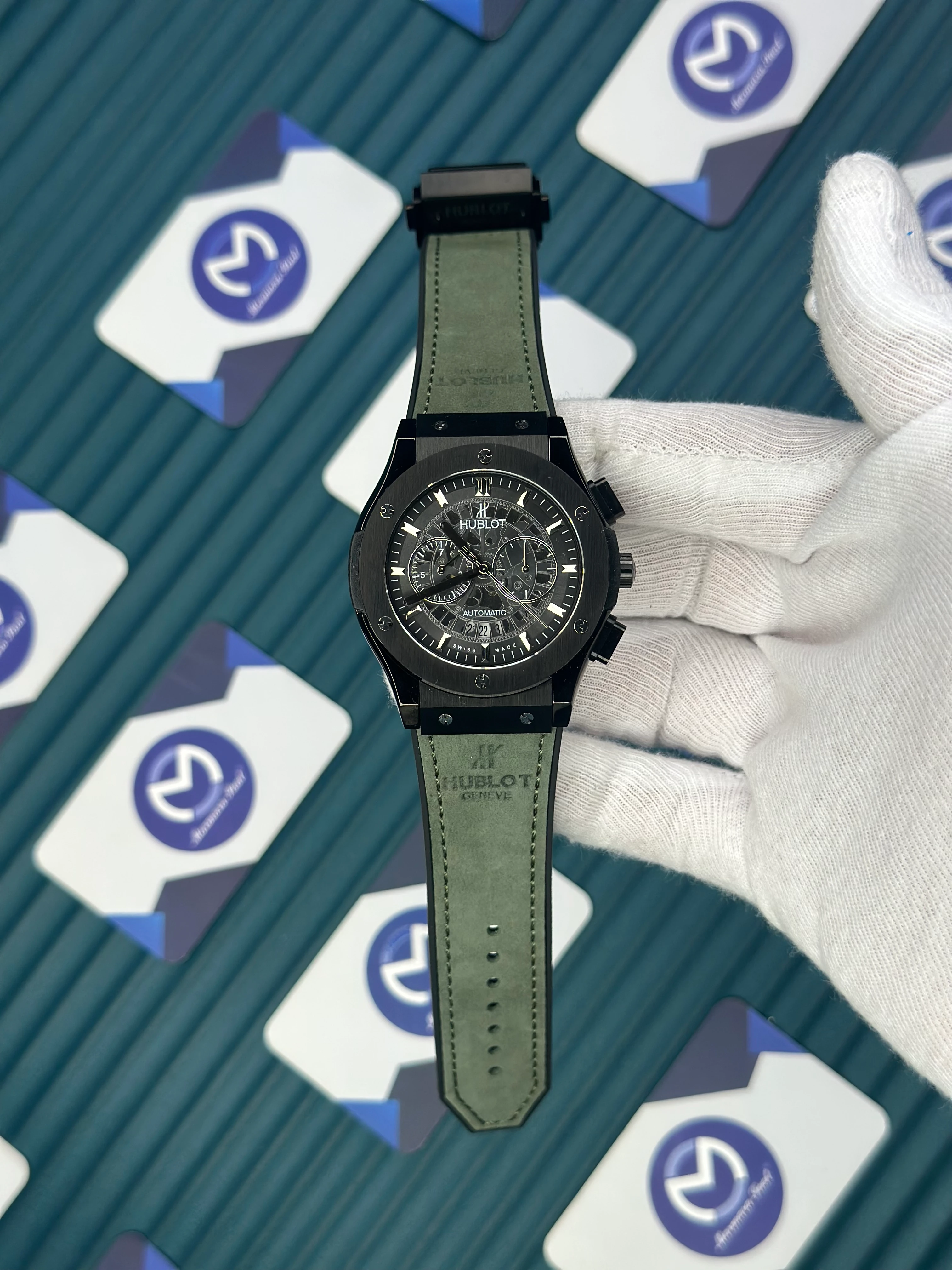 HUBLOT AUTOMATIC SKELETON DIAL BLACK CASE GREEN LEATHER CORD 