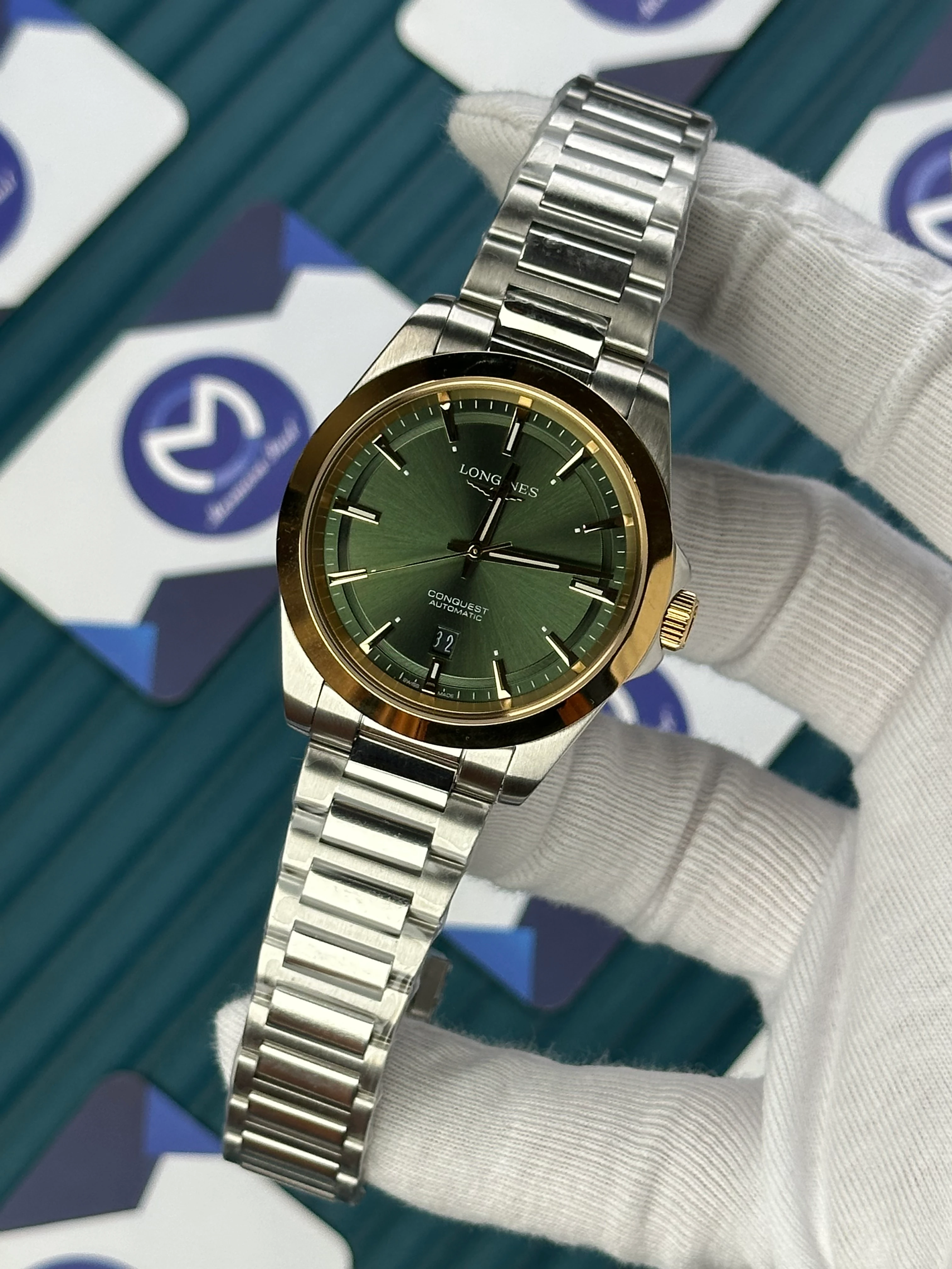 LONGINES CONQUEST AUTOMATIC GREEN DIAL GOLD BEZEL SILVER 