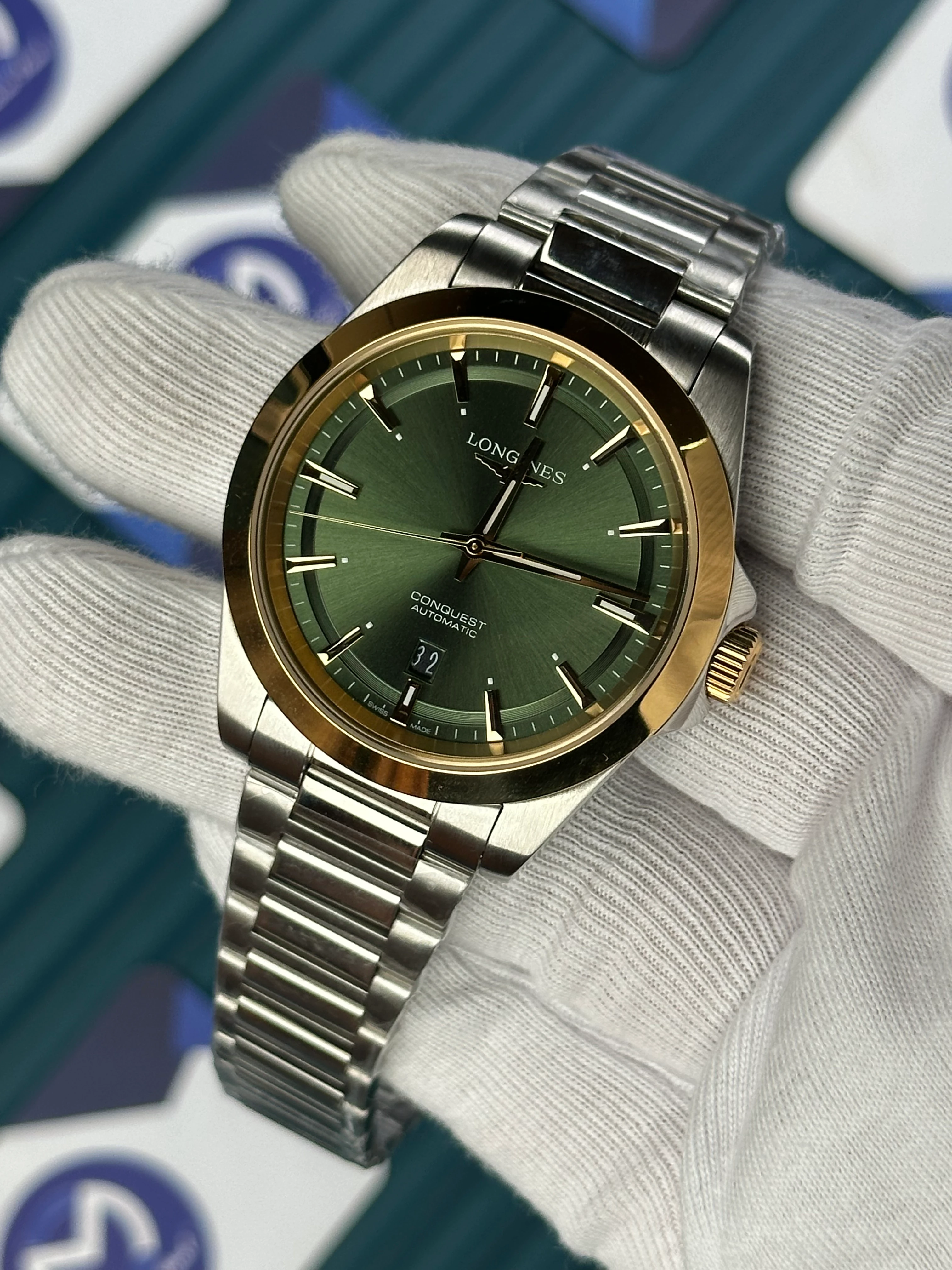 LONGINES CONQUEST AUTOMATIC GREEN DIAL GOLD BEZEL SILVER 