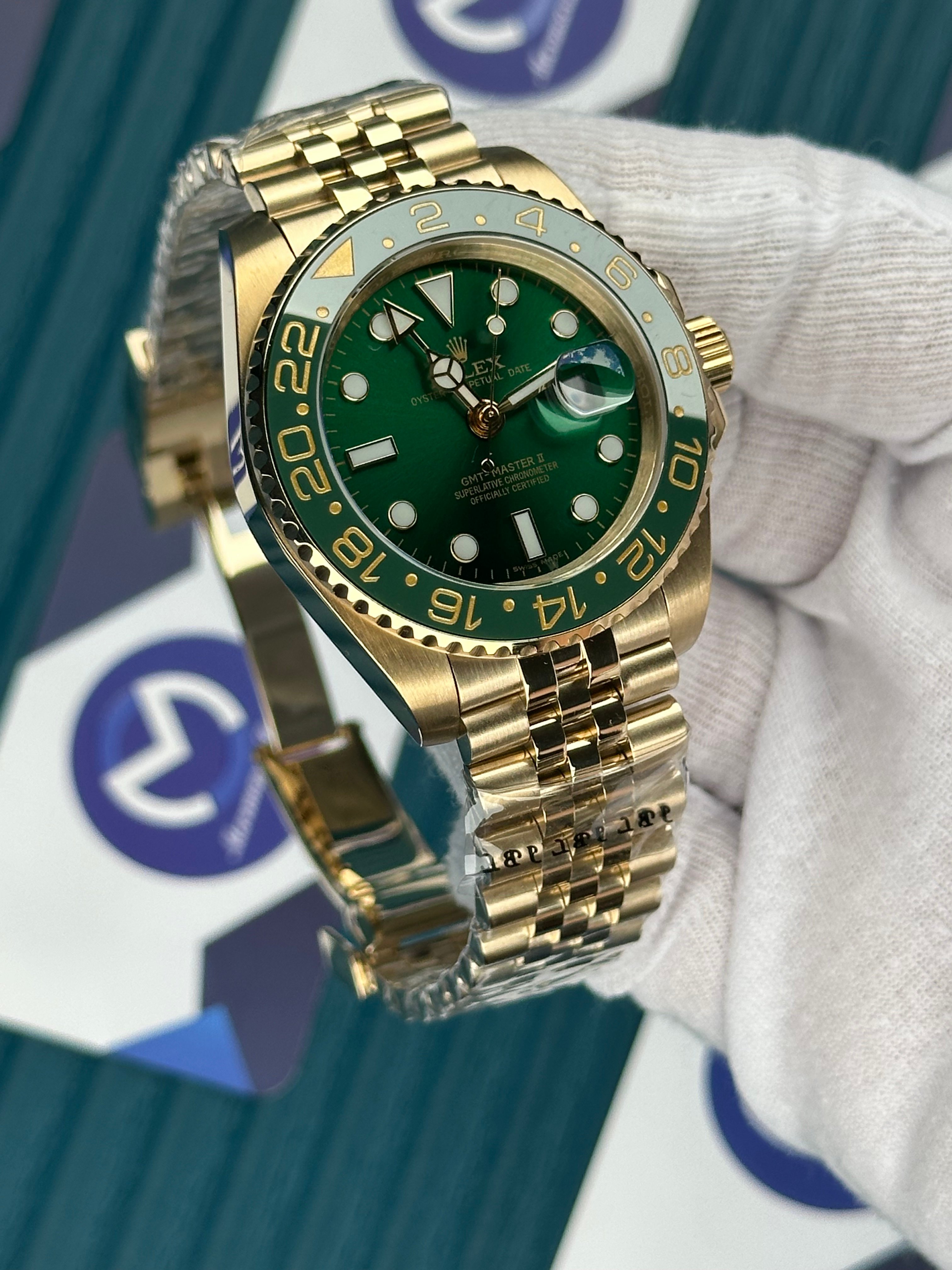 ROLEX GMT MASTER II GREEN DIAL GOLD JUBILE