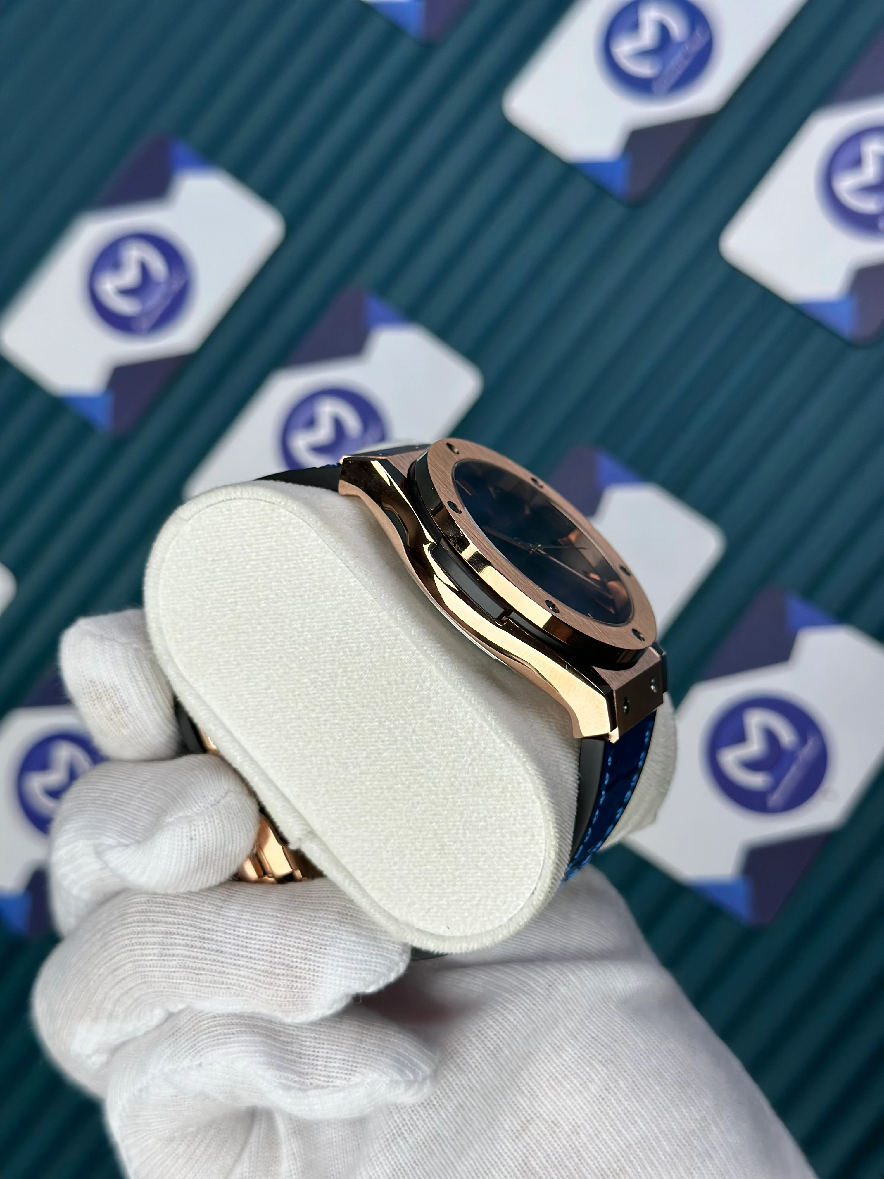 HUBLOT GENEVE AUTOMATIC VENDOME BLUE DIAL AND LEATHER CORD ROSE CASE