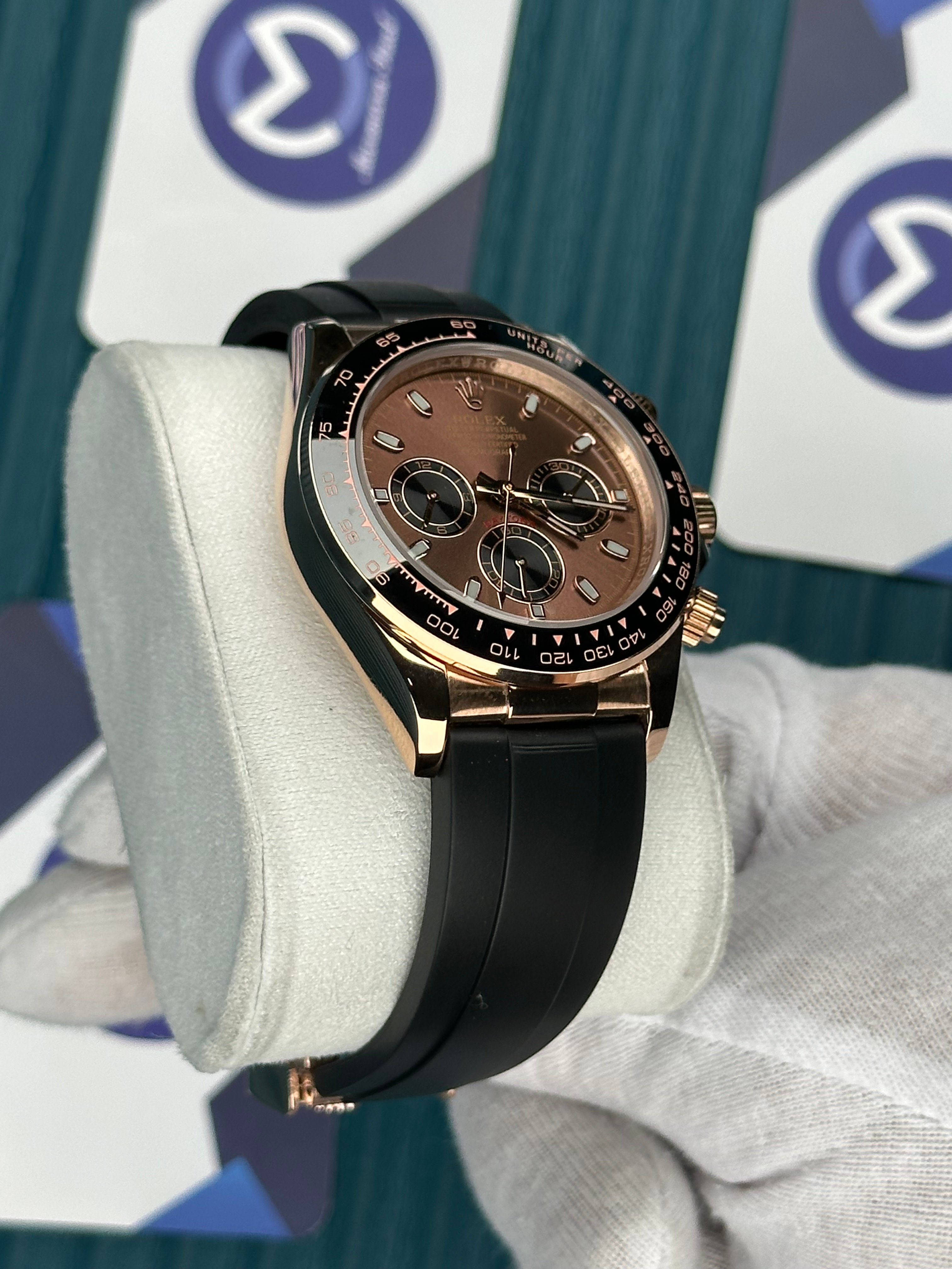 ROLEX DAYTONA BROWN DIAL ROSE CASE BLACK OYSTERFLEX